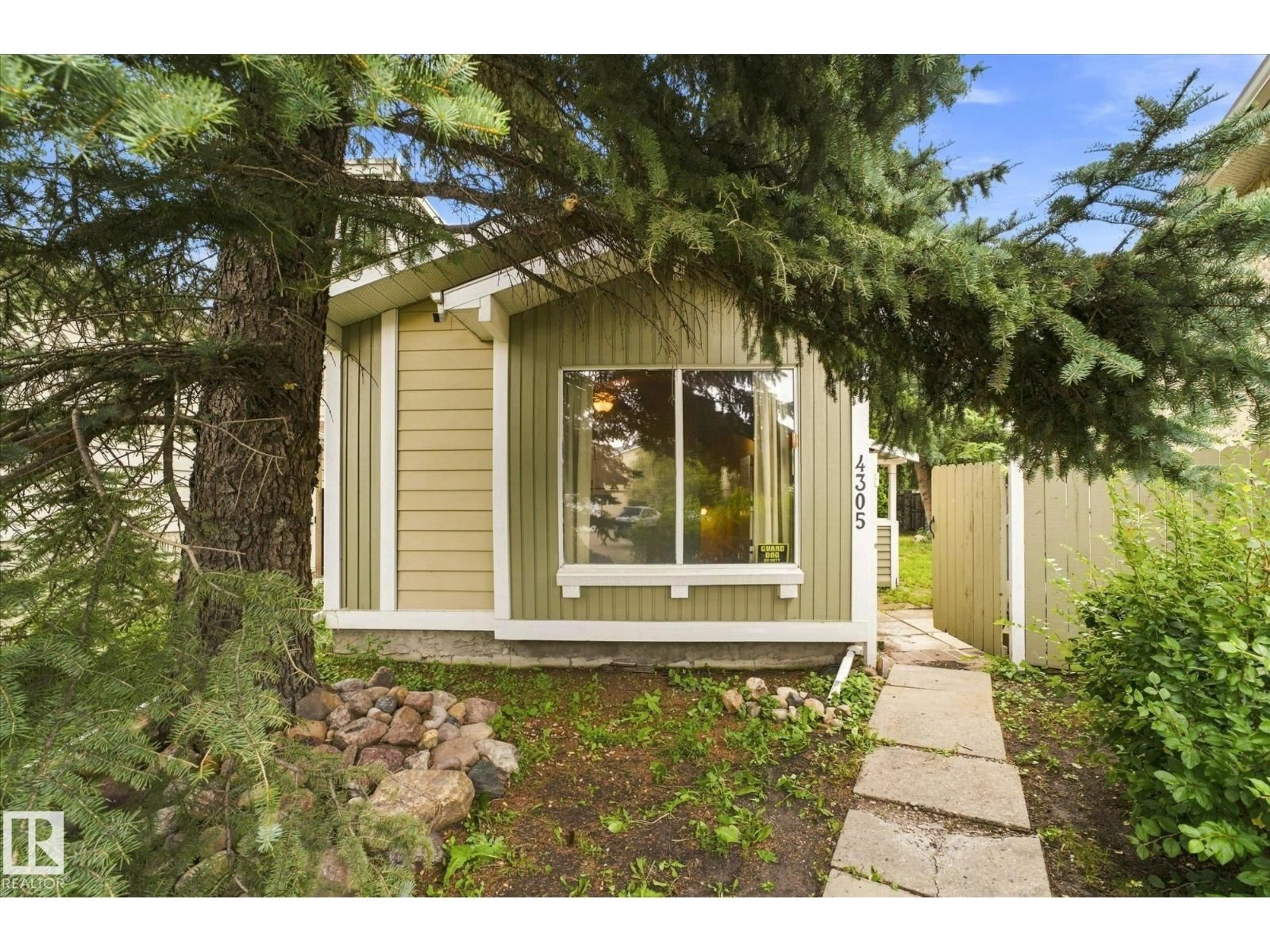Home with vinyl exterior material, street for NW - 4305 35 ST, Edmonton Alberta T6L5J6
