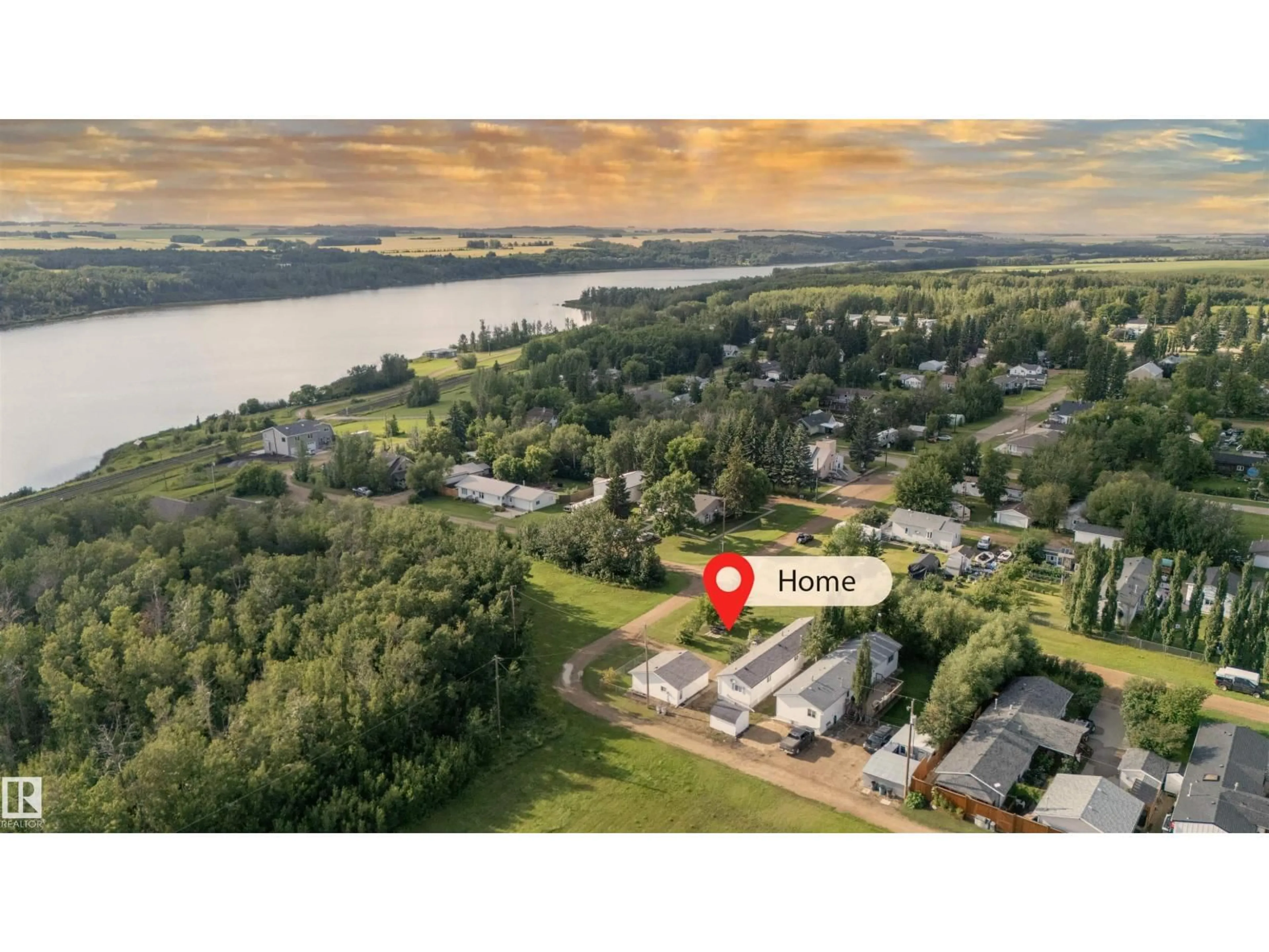 A pic from outside/outdoor area/front of a property/back of a property/a pic from drone, water/lake/river/ocean view for 121 LINDGREN ST, Ferintosh Alberta T0B1M0