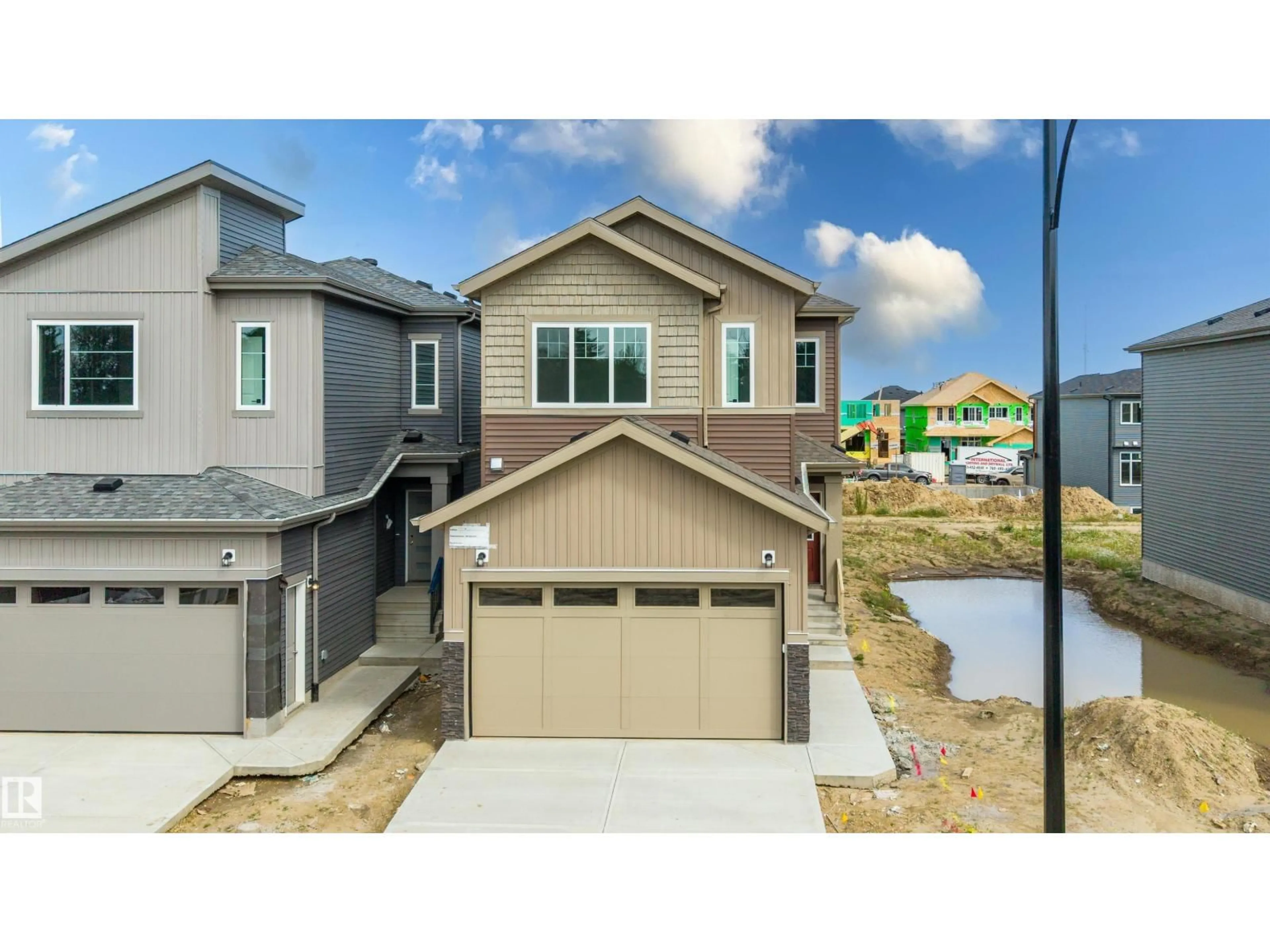 Home with vinyl exterior material, street for 1786 CROSSBILL LO, Edmonton Alberta T5S0Y5