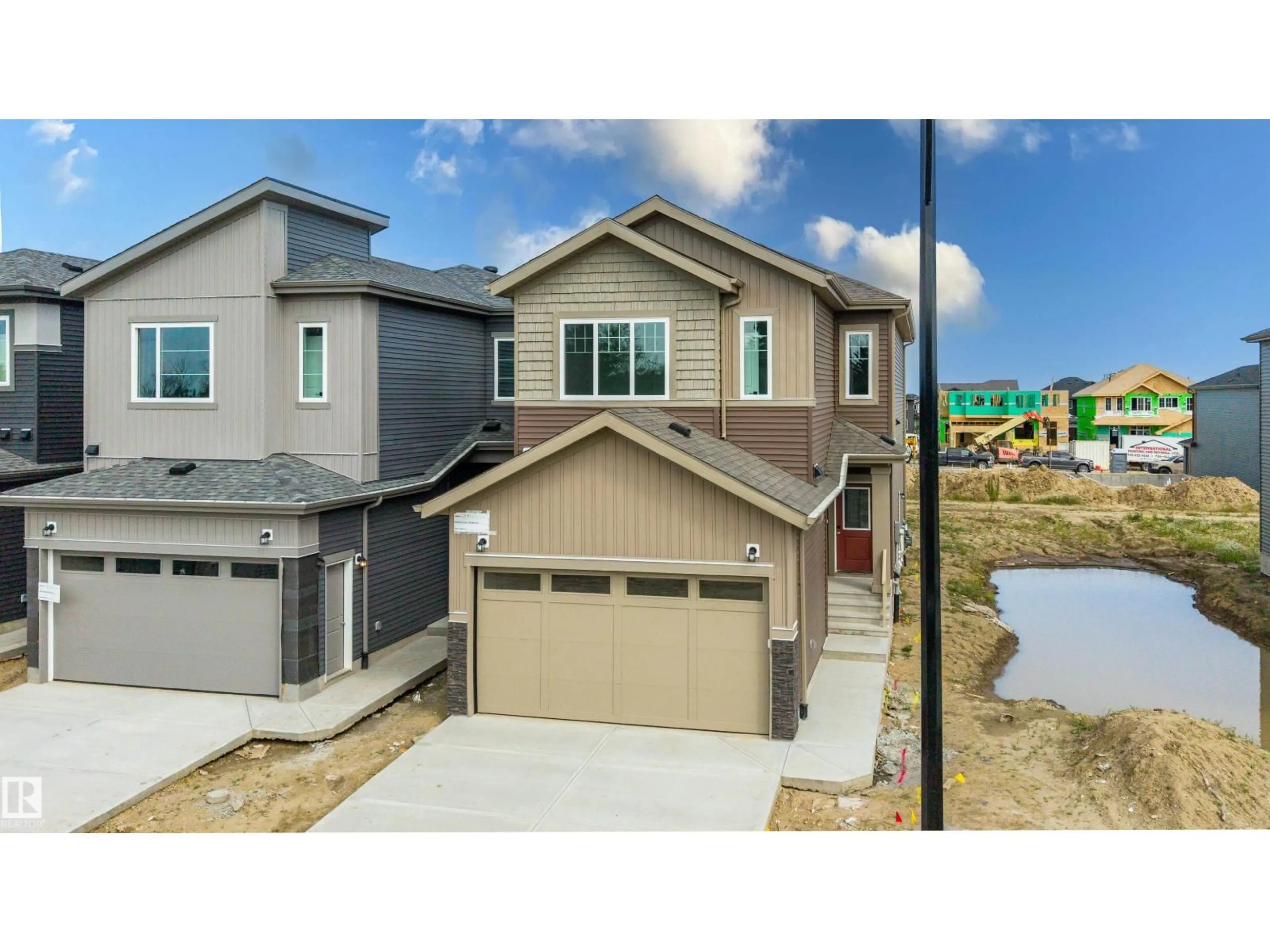 Home with vinyl exterior material, street for 1786 CROSSBILL LO, Edmonton Alberta T5S0Y5