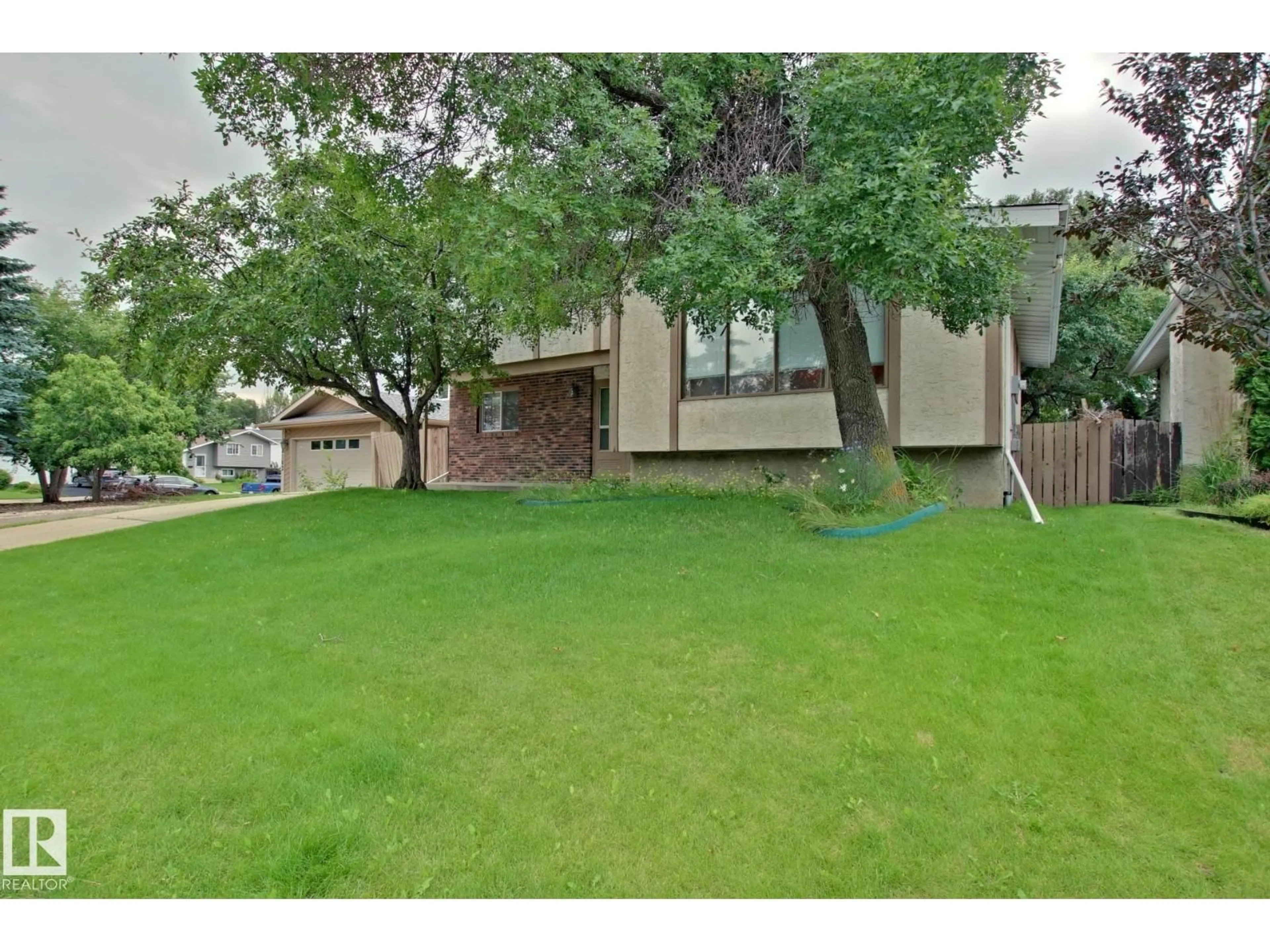 A pic from outside/outdoor area/front of a property/back of a property/a pic from drone, street for 18107 89 AV, Edmonton Alberta T5T0Z7