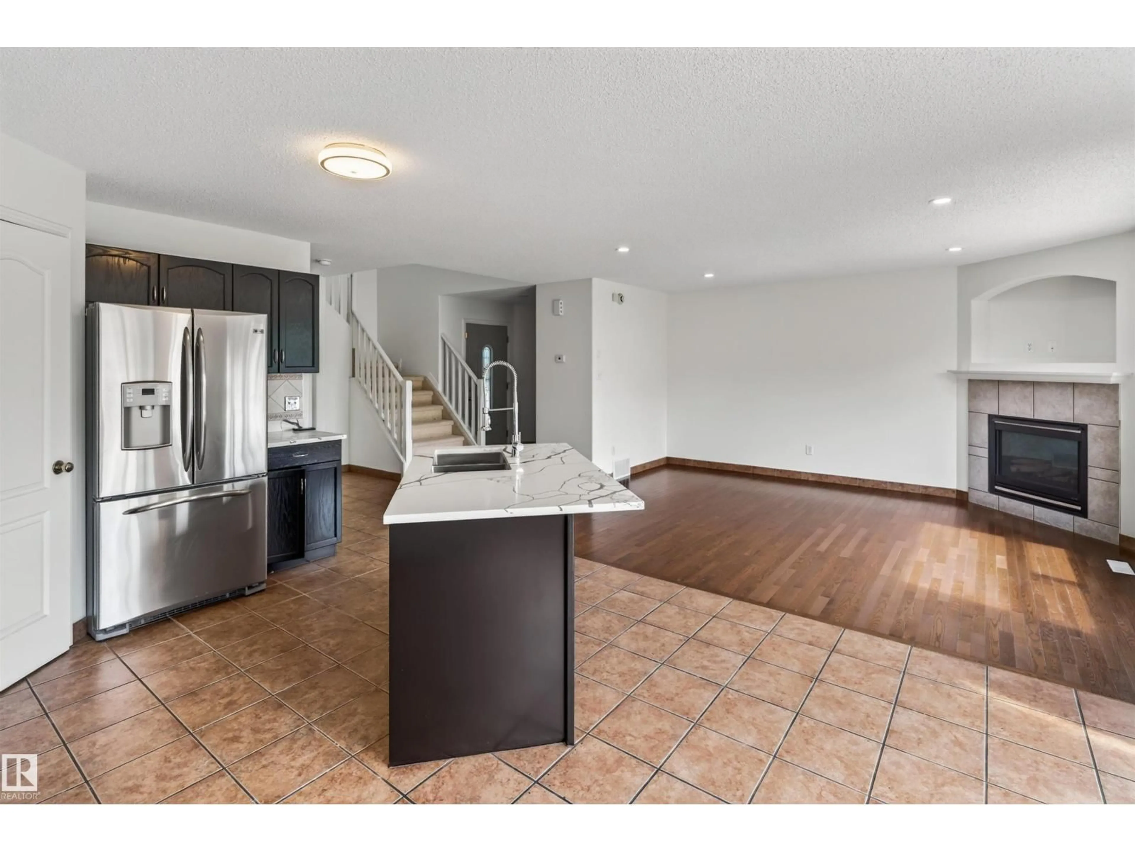 Open concept kitchen, ceramic/tile floor for 1707 37A AV, Edmonton Alberta T6T1X9
