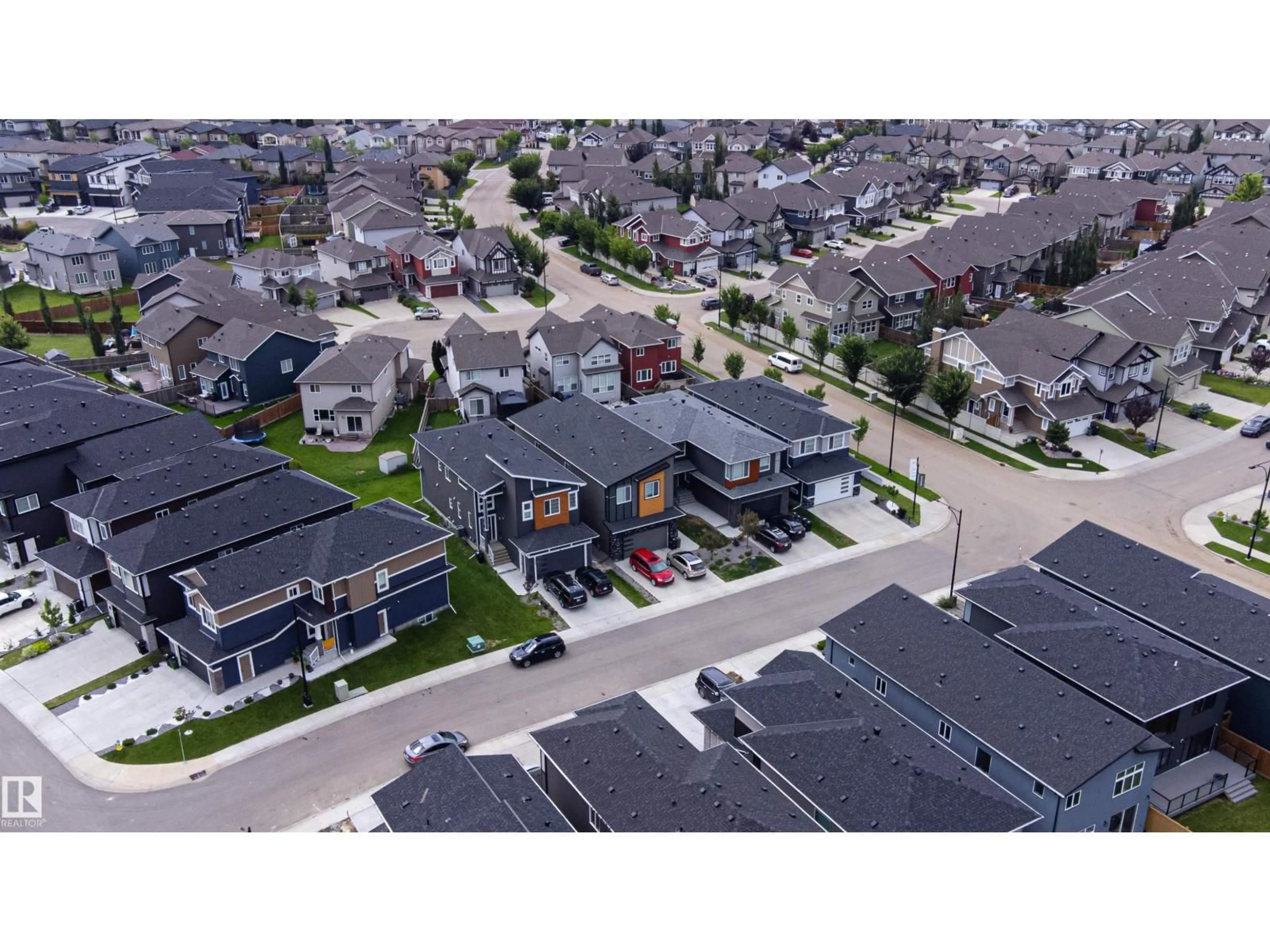 A pic from outside/outdoor area/front of a property/back of a property/a pic from drone, street for 6907 173 AV, Edmonton Alberta T5Z0W4