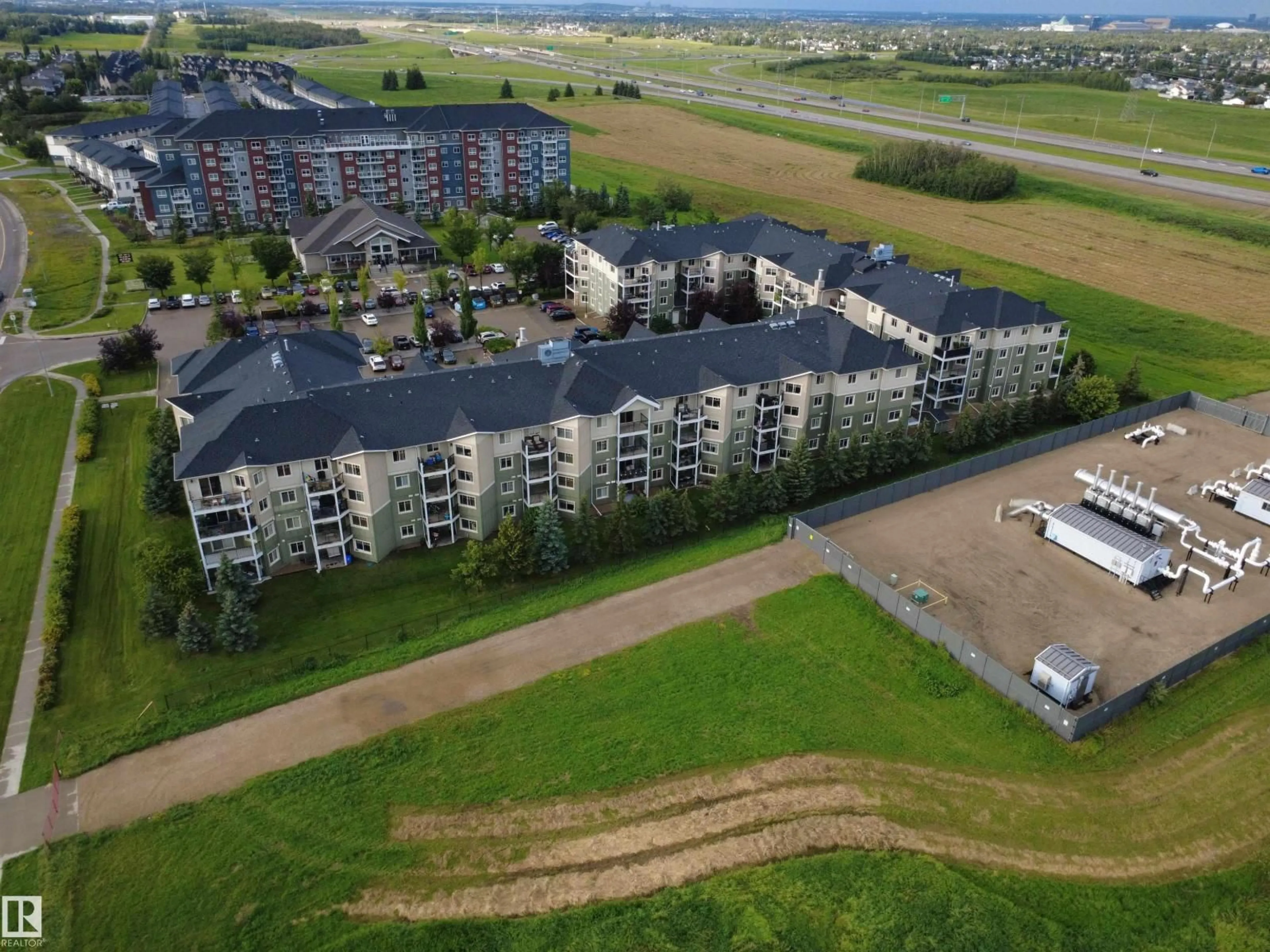 A pic from outside/outdoor area/front of a property/back of a property/a pic from drone, unknown for 208 - 6921 199 ST, Edmonton Alberta T5T3X7