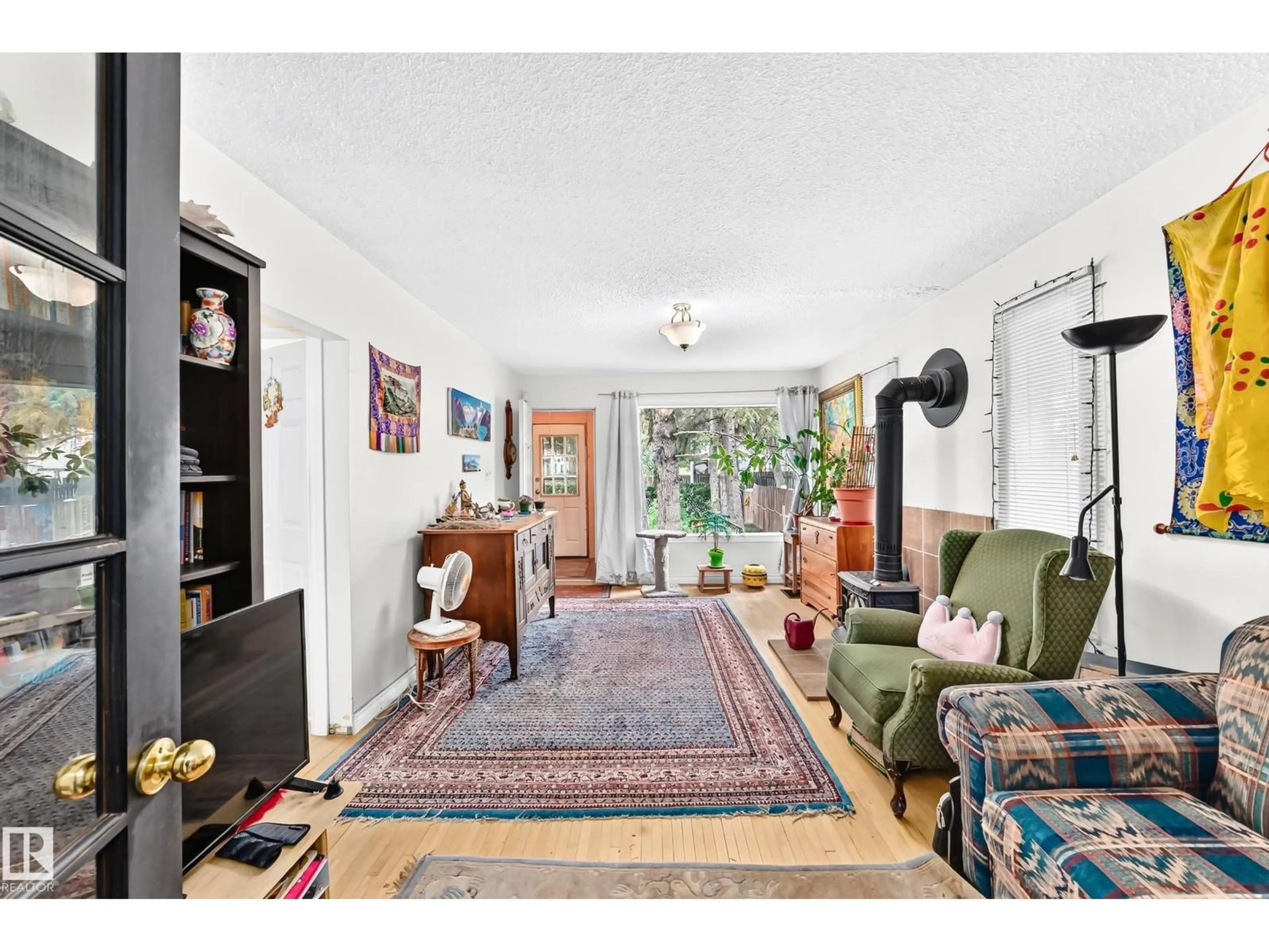 Living room with furniture, unknown for 12031 90 ST, Edmonton Alberta T5B3Z2