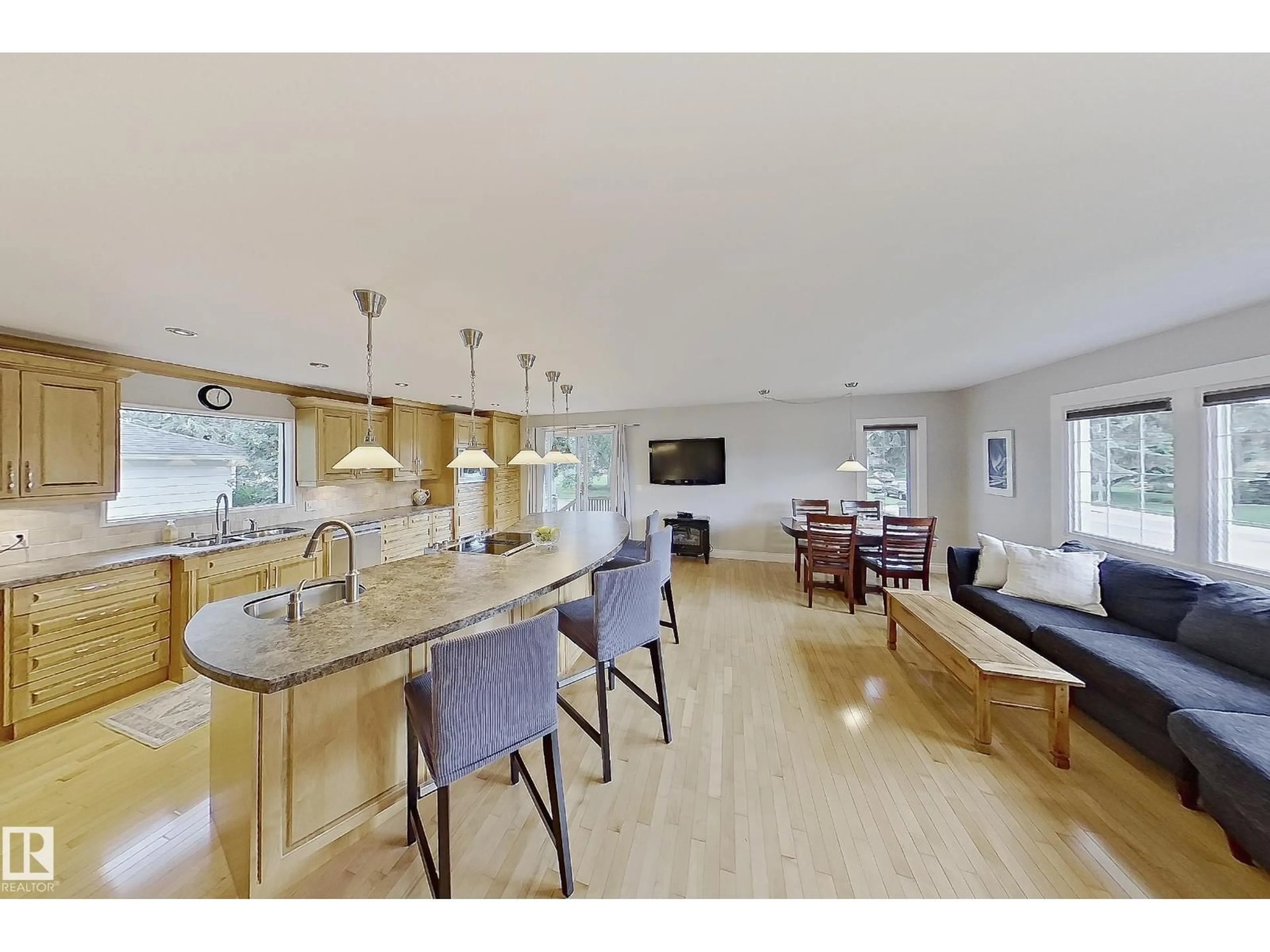 Open concept kitchen, wood/laminate floor for NW - 4707 108 AV, Edmonton Alberta T6A1P4