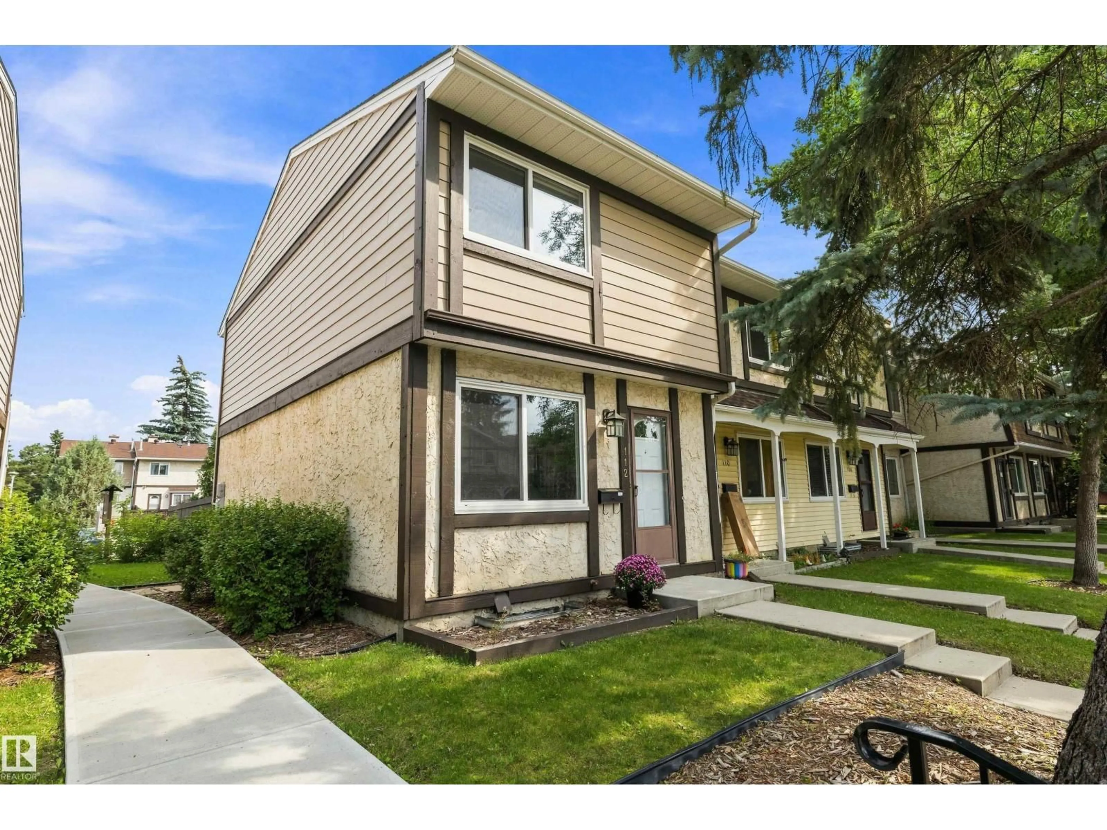 Home with vinyl exterior material, street for 112 TUDOR LN, Edmonton Alberta T6J3T5