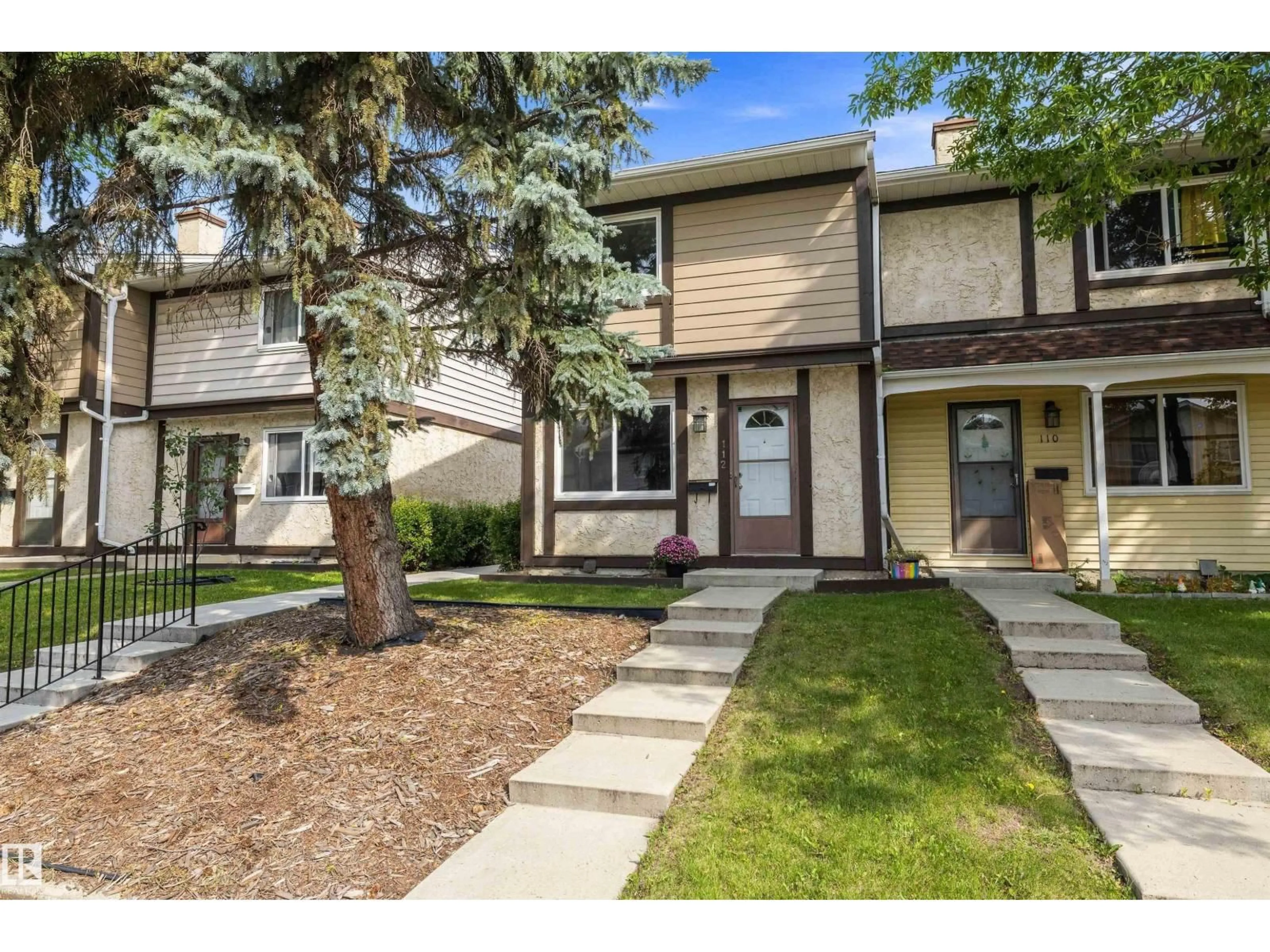 Home with vinyl exterior material, street for 112 TUDOR LN, Edmonton Alberta T6J3T5