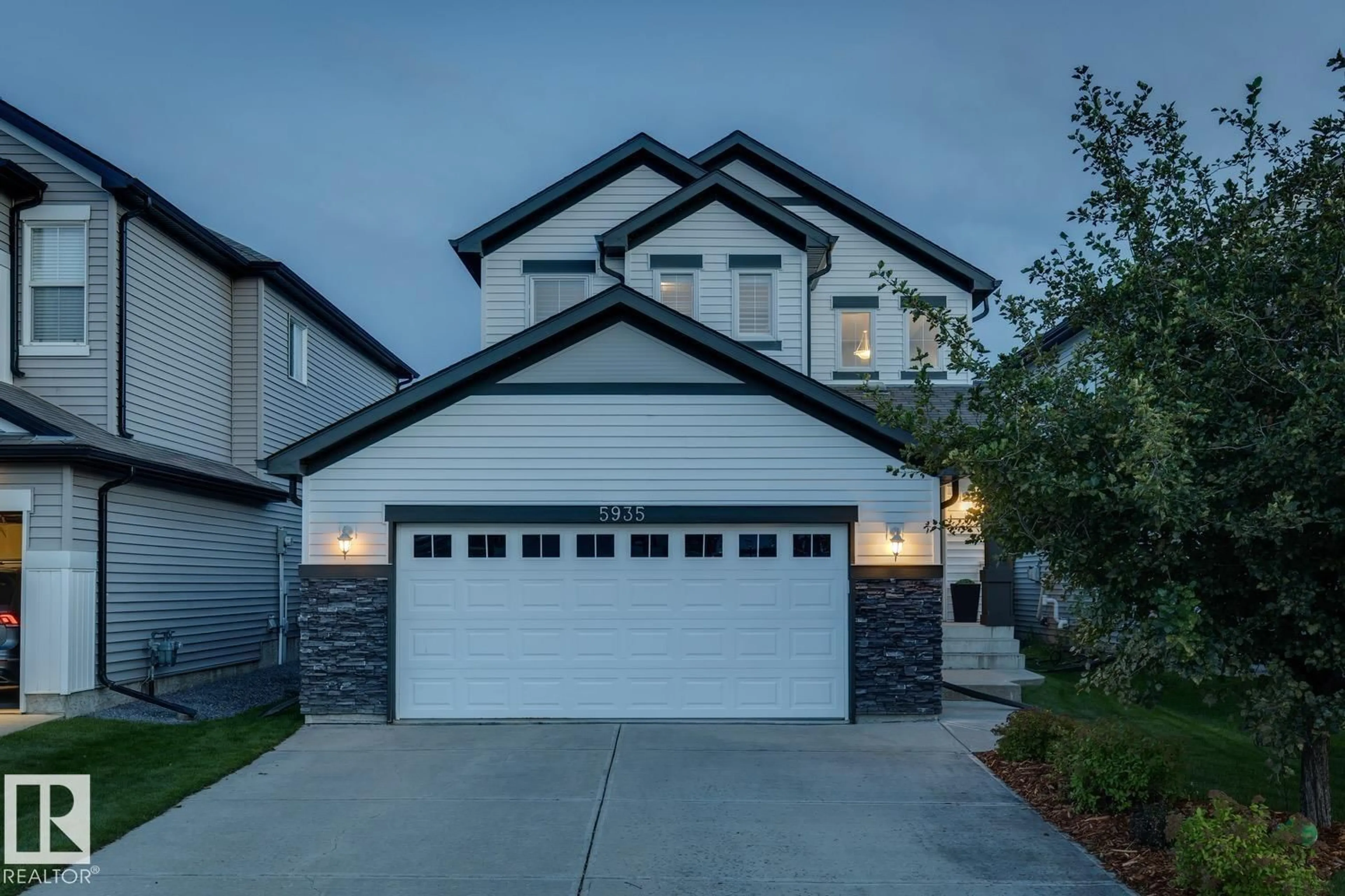 Home with vinyl exterior material, street for 5935 18 AV, Edmonton Alberta T6X0W4