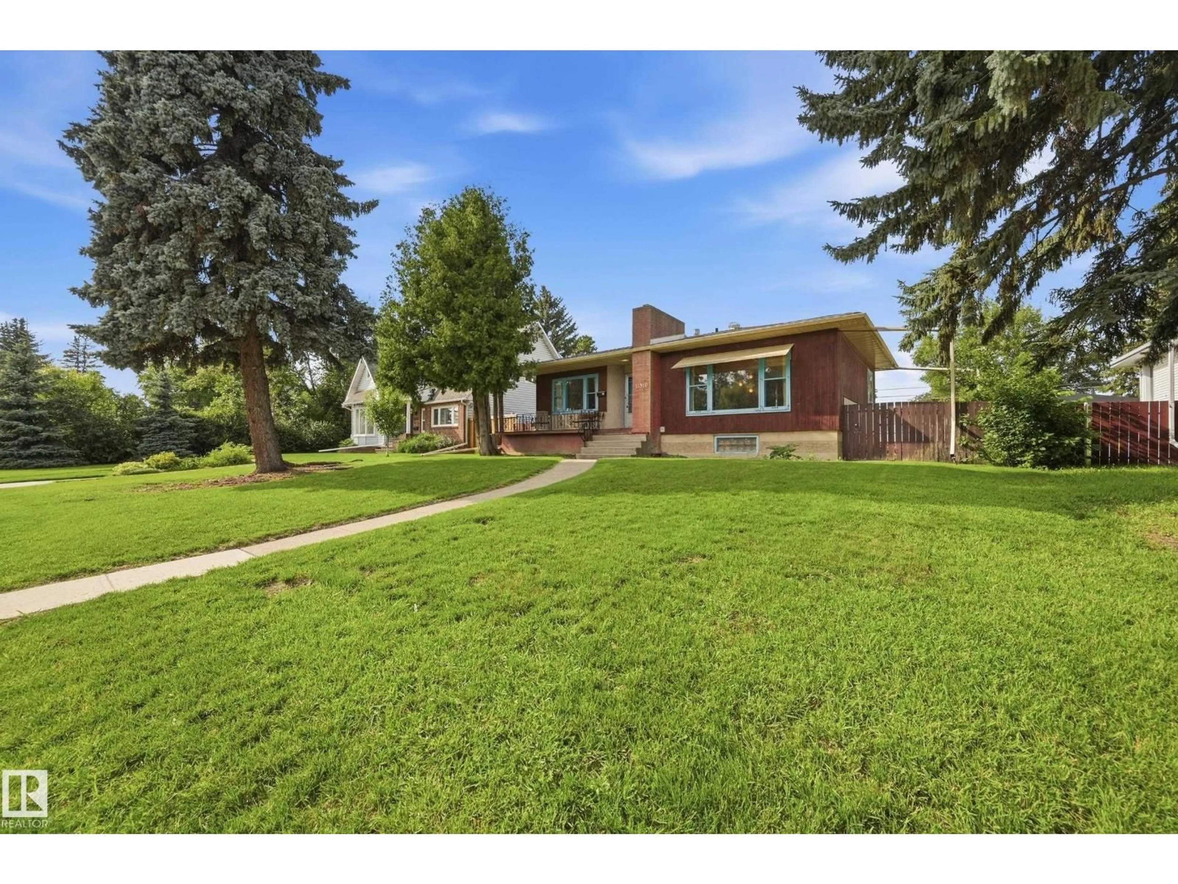 Home with brick exterior material, street for NW - 11310 110 AV, Edmonton Alberta T5H1J3