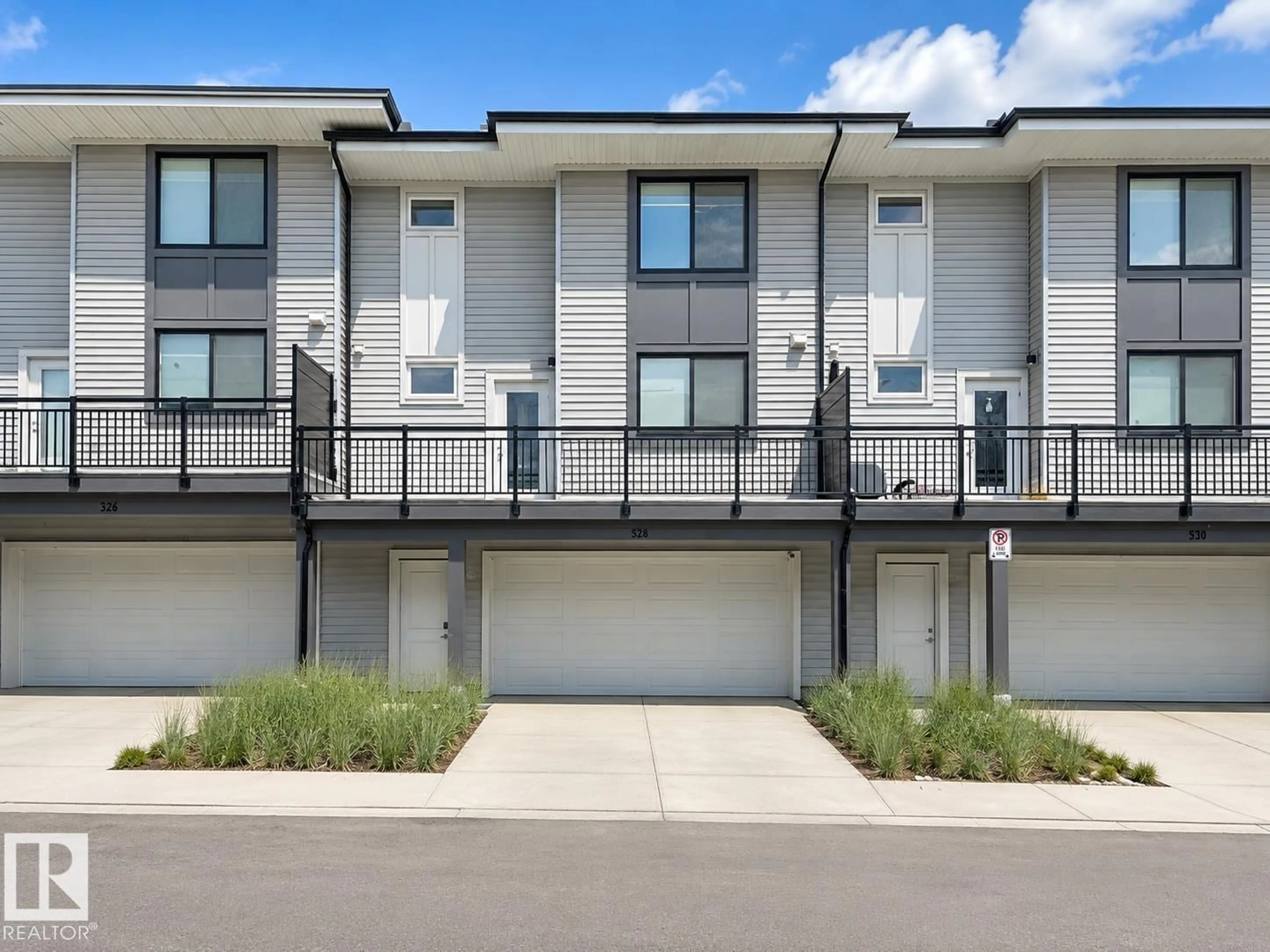 Home with vinyl exterior material, street for 857 - 528 BELMONT DR, Calgary Alberta T2X4P2