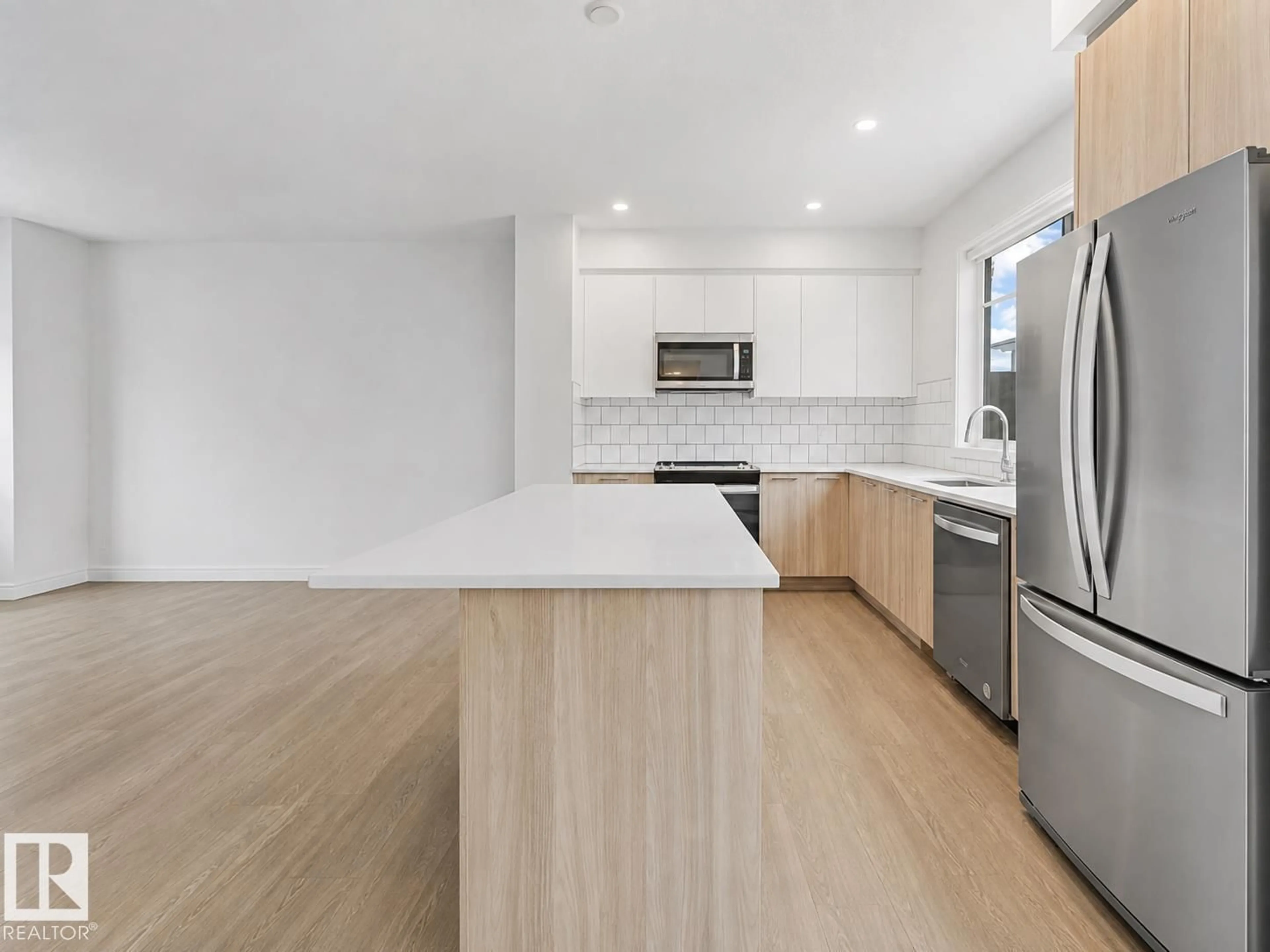 Open concept kitchen, unknown for 857 - 528 BELMONT DR, Calgary Alberta T2X4P2