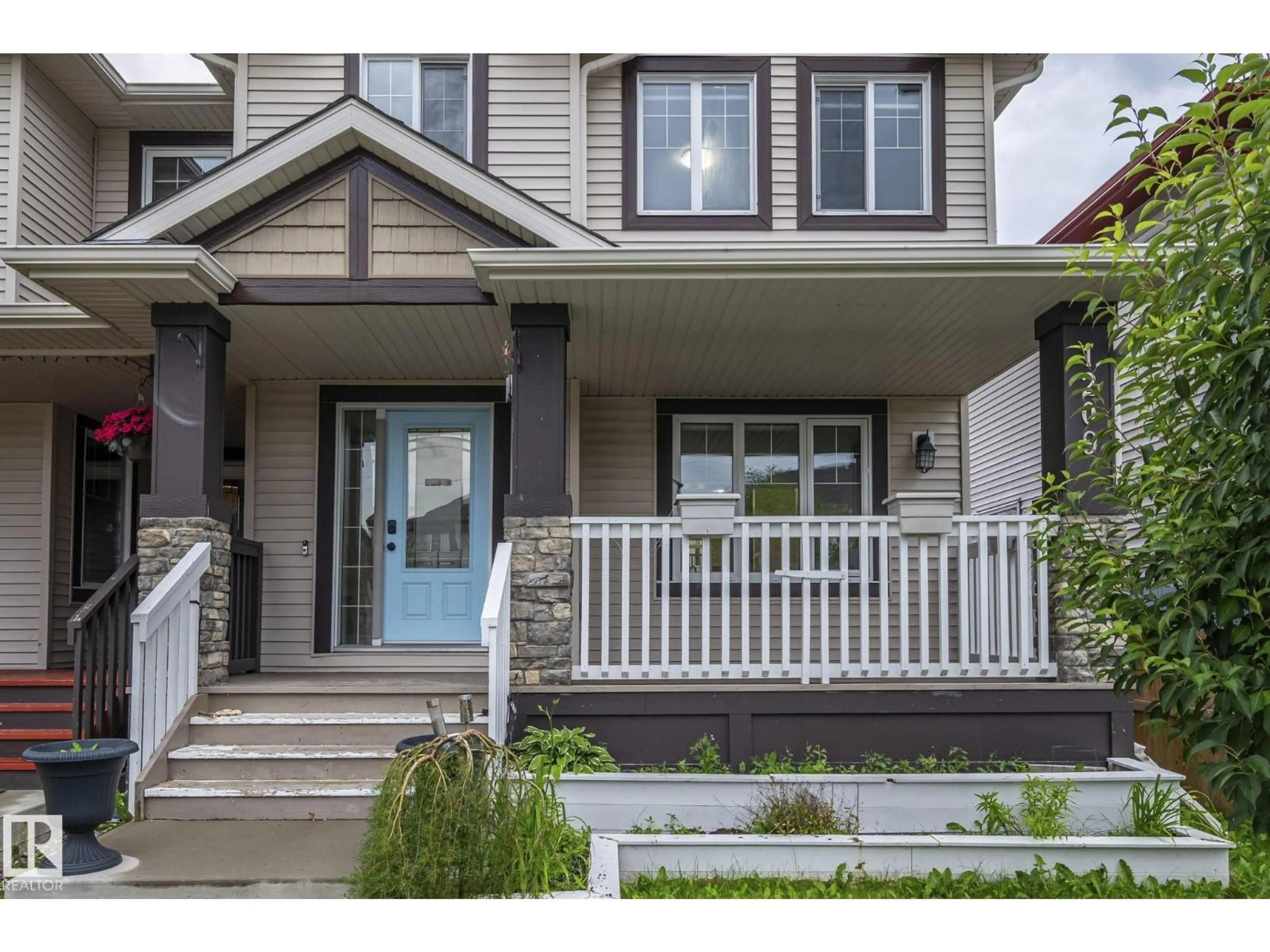 Home with vinyl exterior material, street for NW - 1209 30 AV, Edmonton Alberta T6T0V7