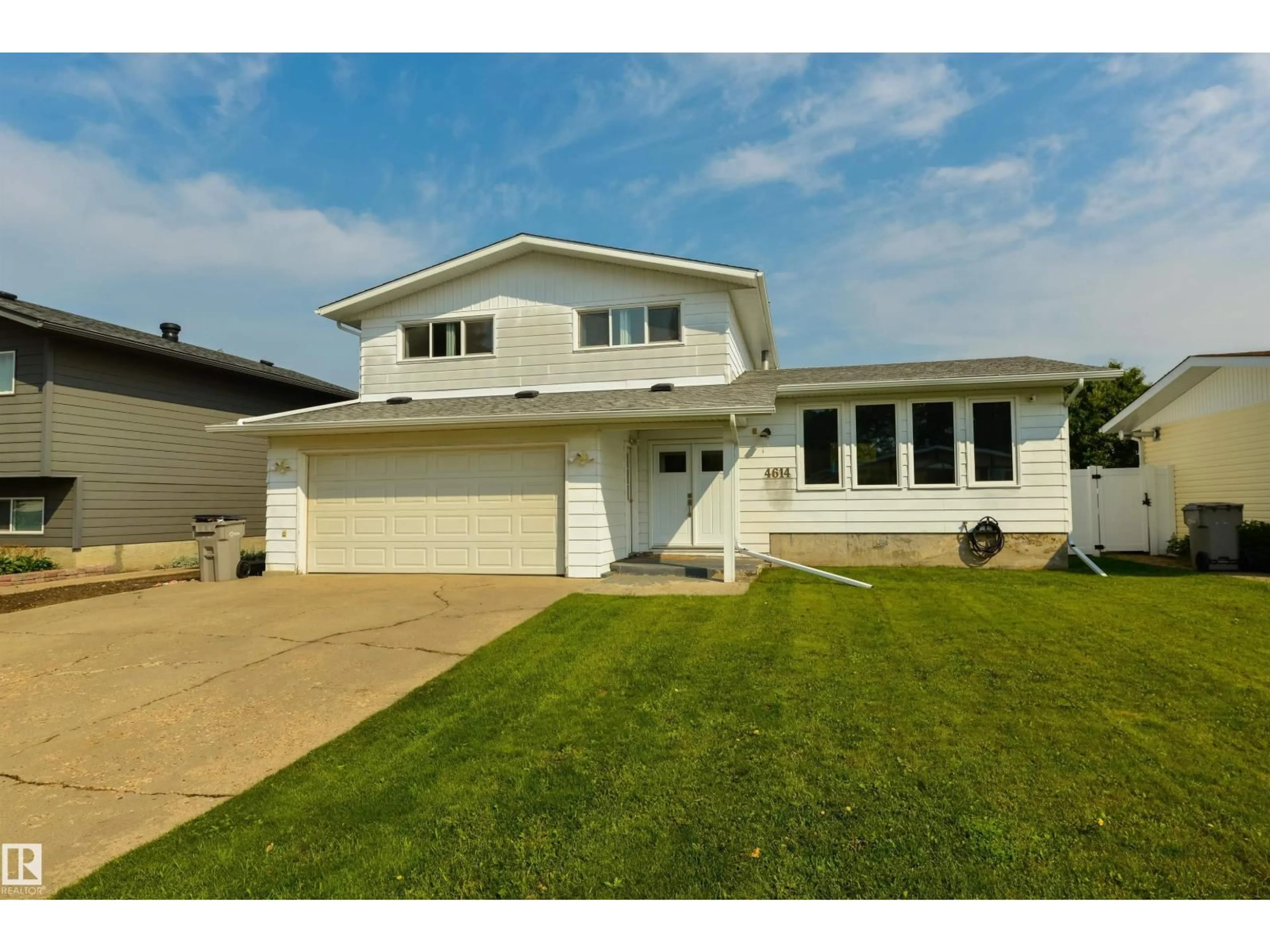 Home with vinyl exterior material, street for 4614 53 AVE, Calmar Alberta T0C0V0