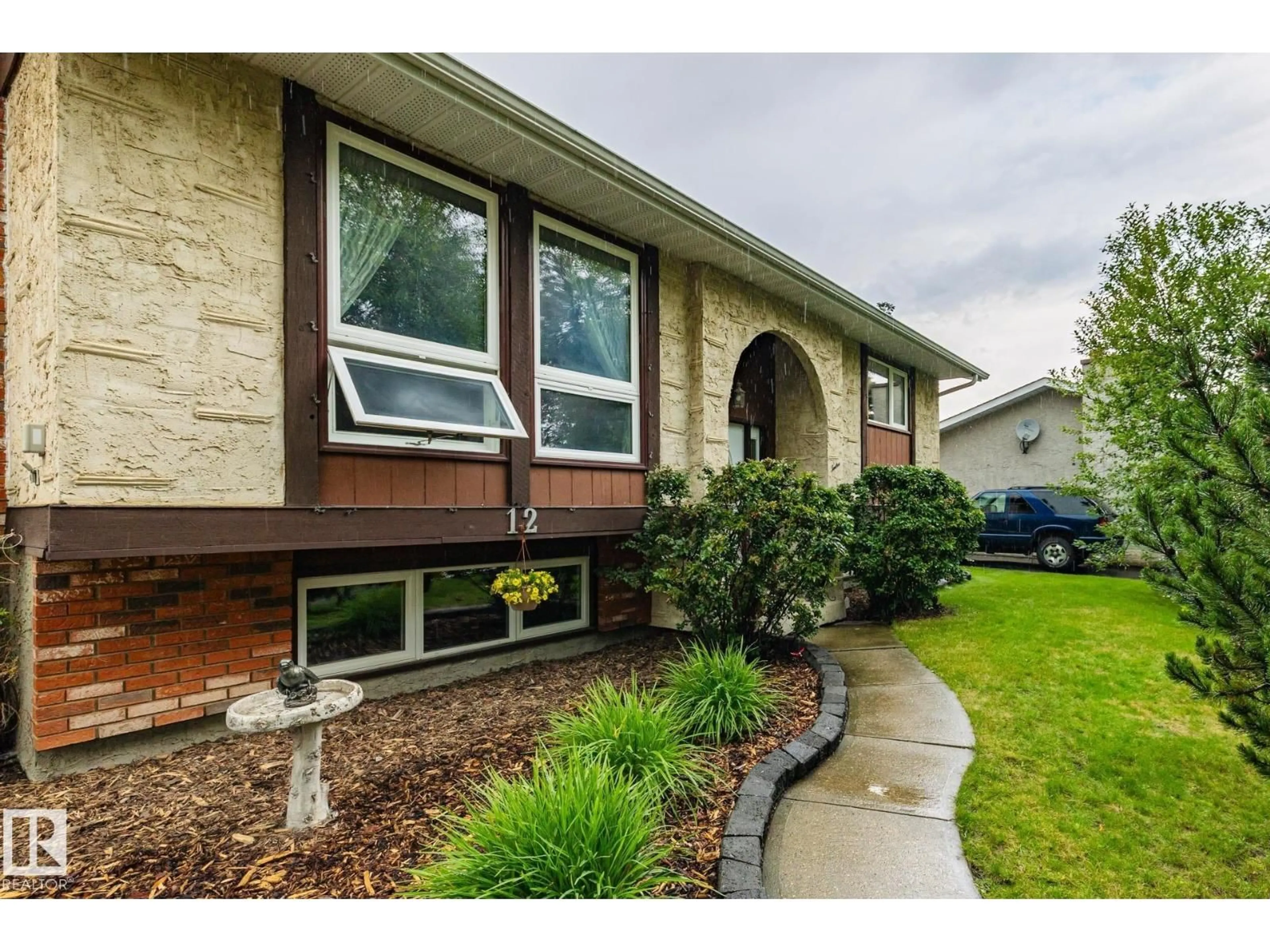 Home with brick exterior material, street for 12 AMHERST CR, St. Albert Alberta T8N2P8
