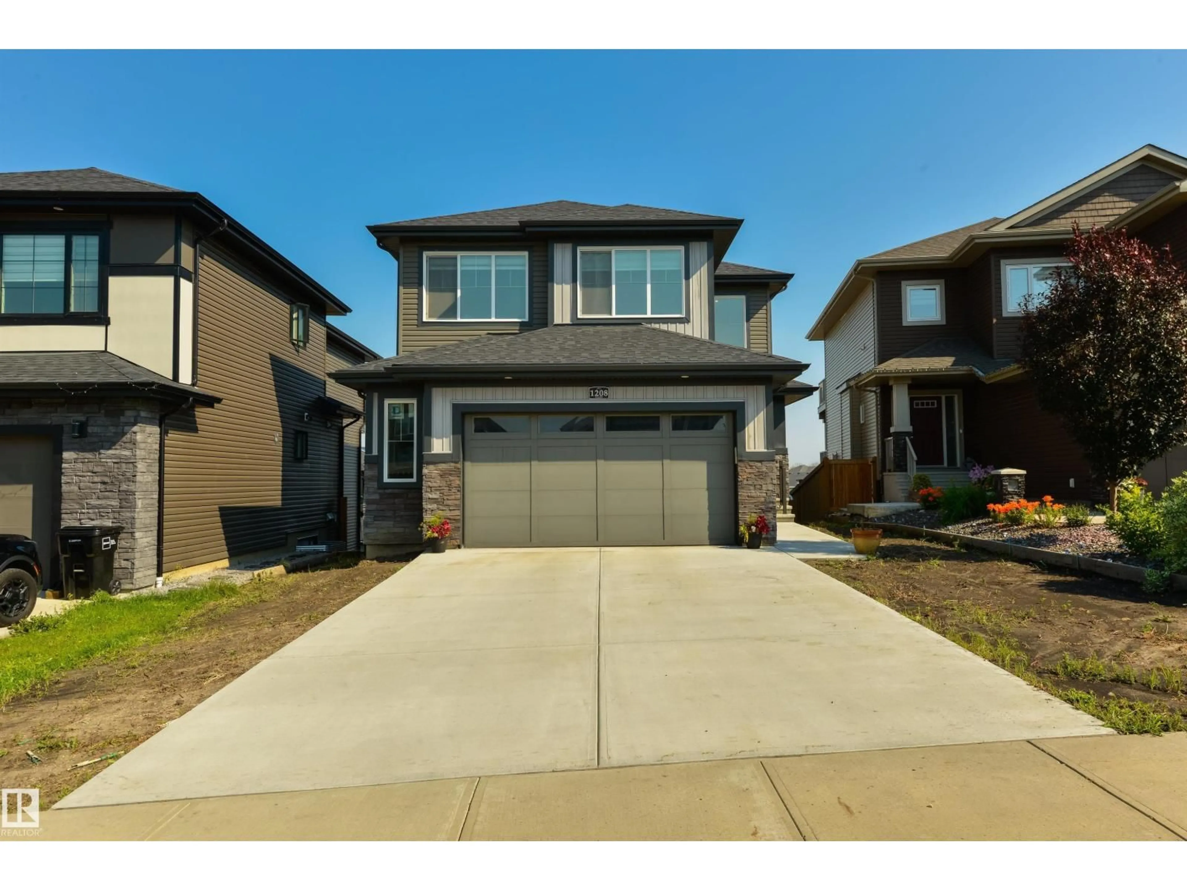 Home with vinyl exterior material, street for 1208 PEREGRINE TC, Edmonton Alberta T5S0M3