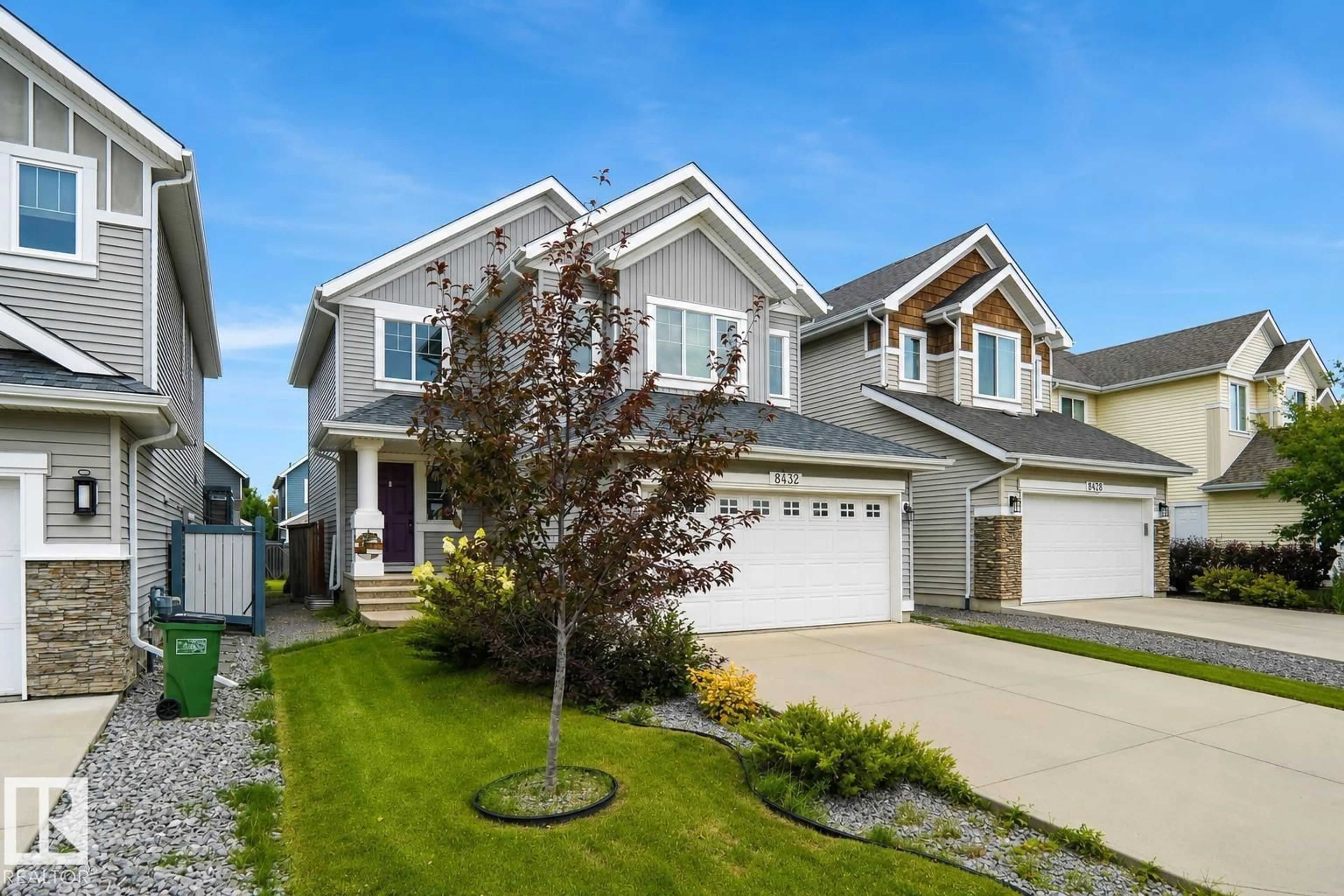 Home with vinyl exterior material, street for SW - 8432 18 AV, Edmonton Alberta T5K2L6