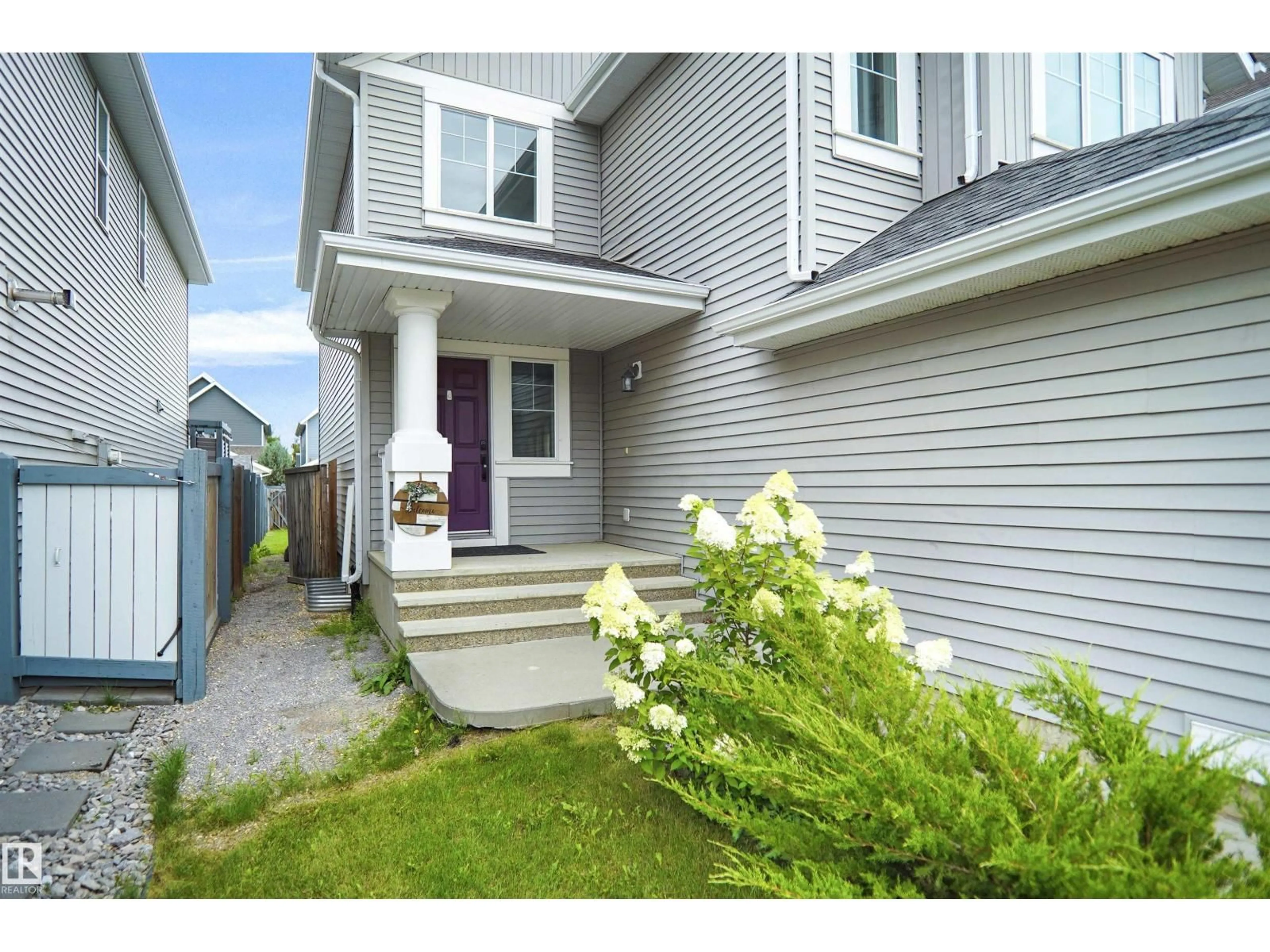 Home with vinyl exterior material, street for SW - 8432 18 AV, Edmonton Alberta T5K2L6
