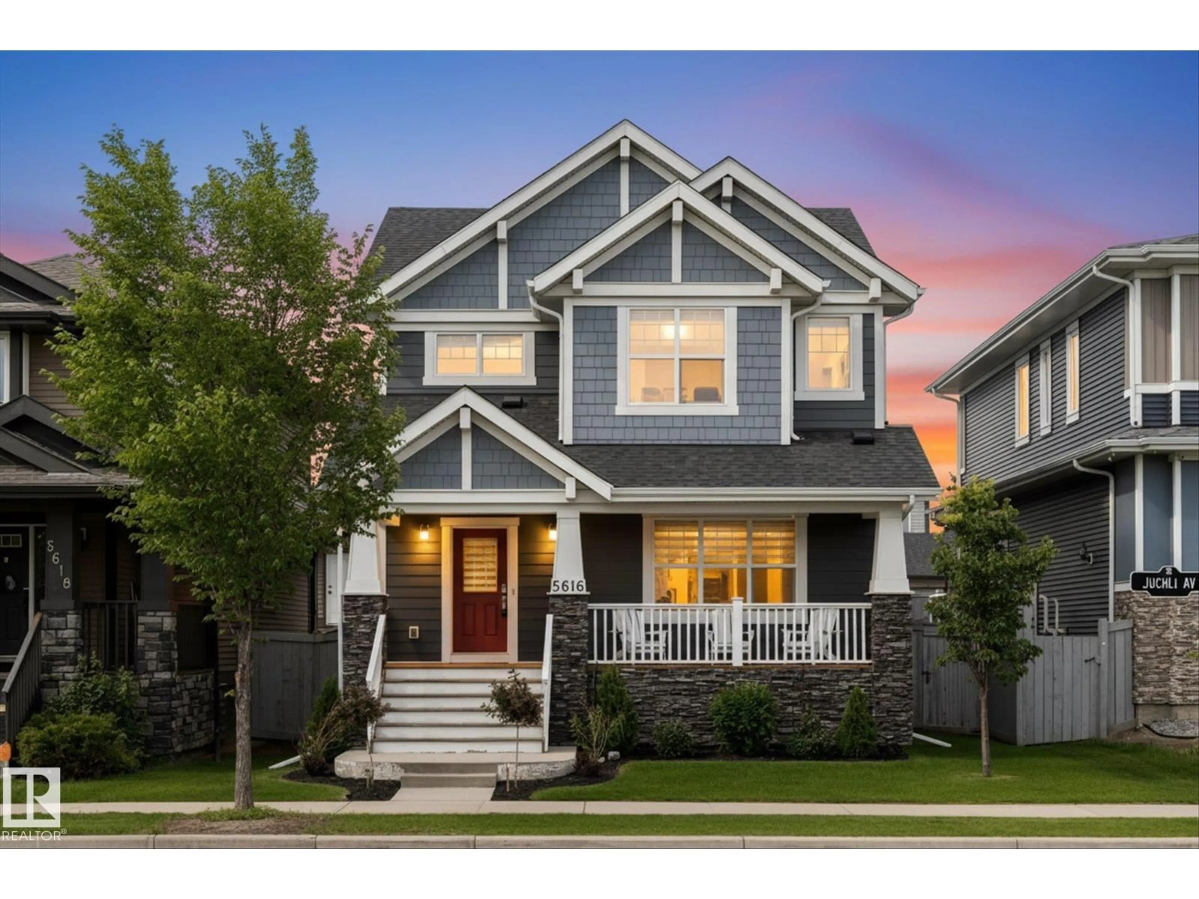 Home with vinyl exterior material, street for 5616 JUCHLI AV, Edmonton Alberta T5E6T6