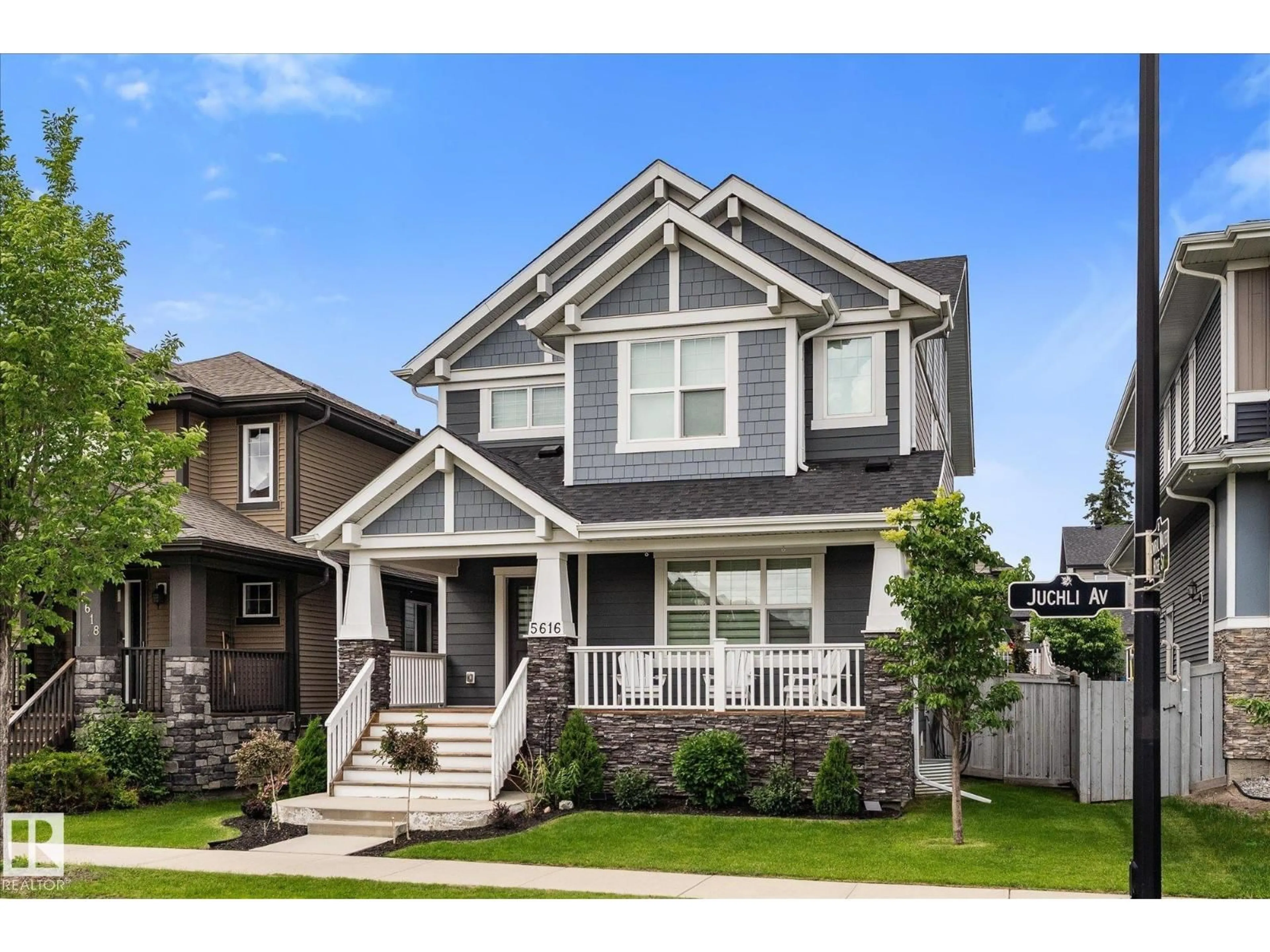 Home with vinyl exterior material, street for 5616 JUCHLI AV, Edmonton Alberta T5E6T6