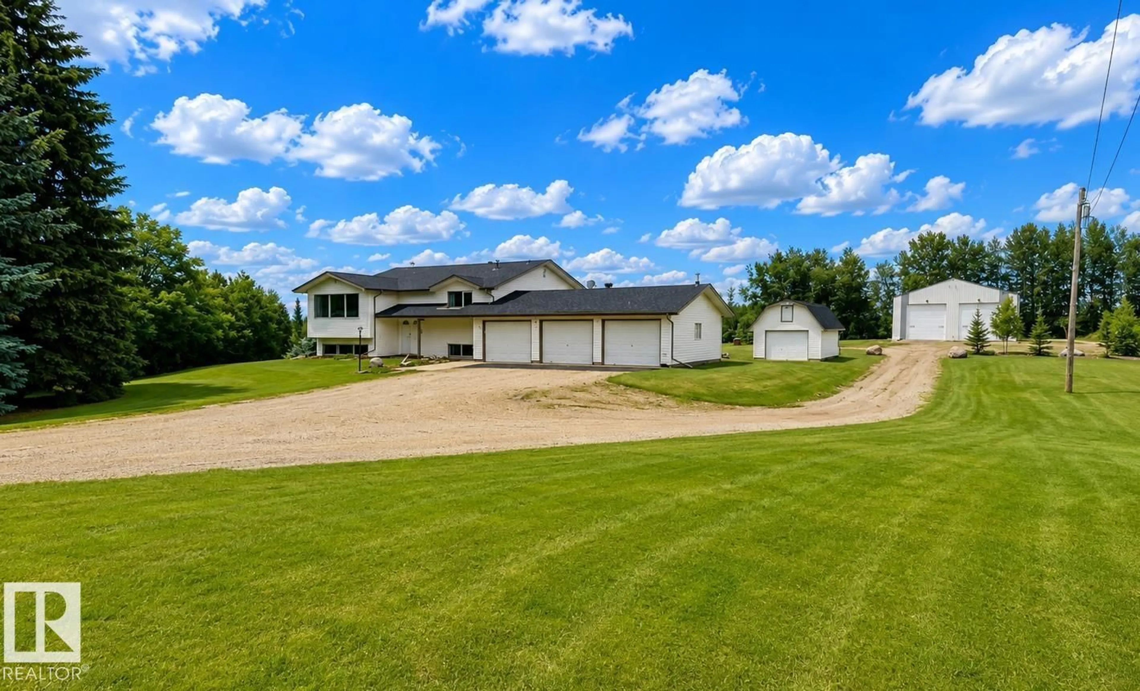 A pic from outside/outdoor area/front of a property/back of a property/a pic from drone, unknown for 27309 TWP ROAD 534, Rural Parkland County Alberta T7X3S1