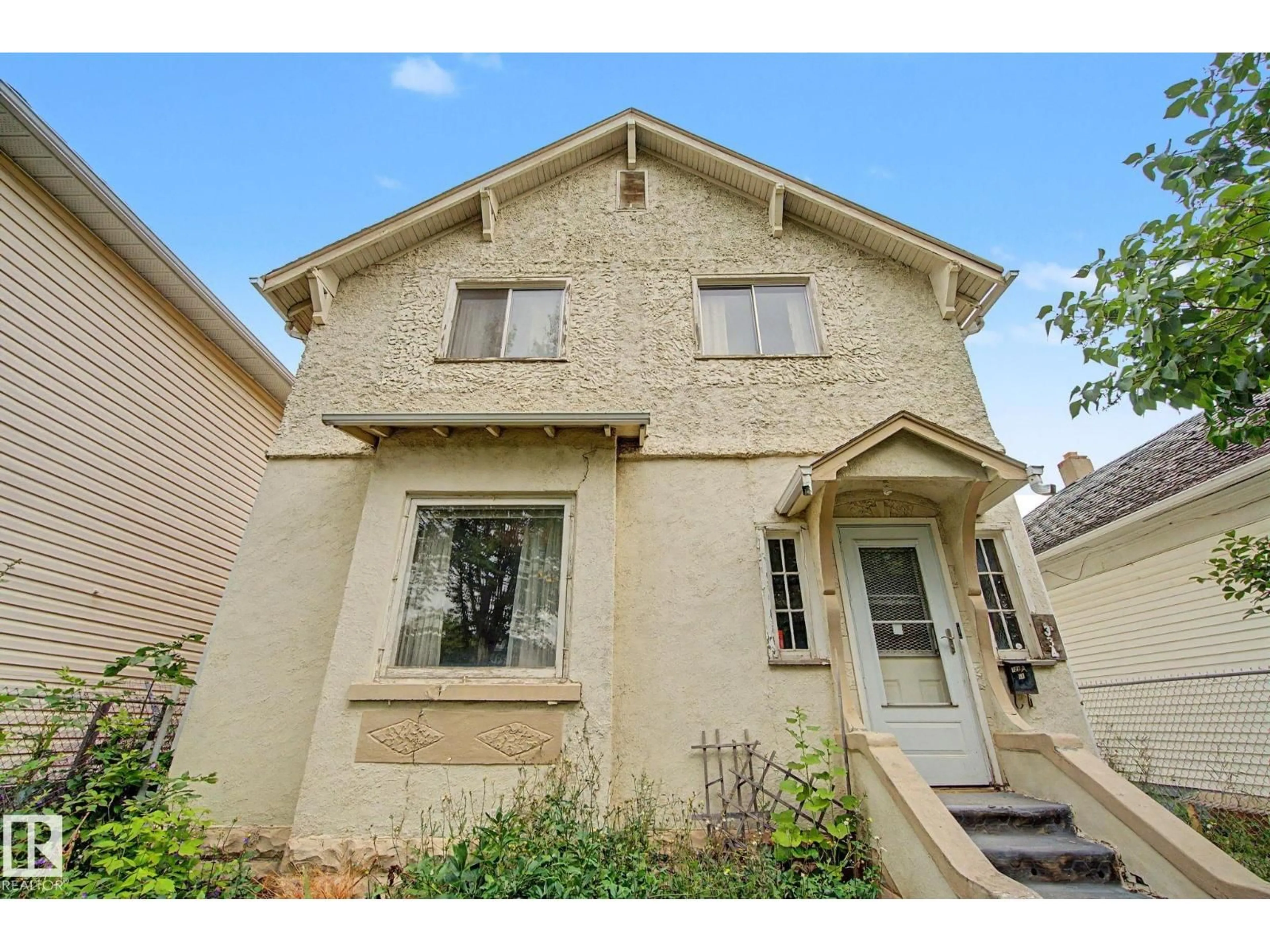 Home with brick exterior material, street for 9334 106A AV, Edmonton Alberta T5H0S7