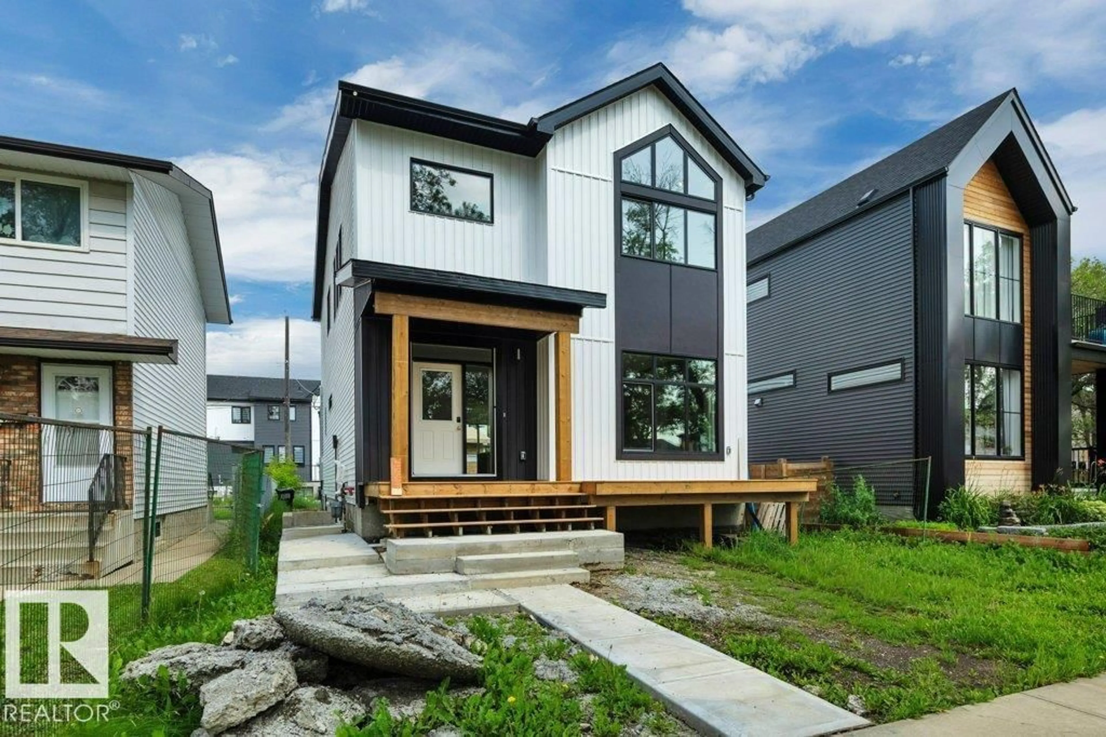 Home with vinyl exterior material, street for 14706 103 AV, Edmonton Alberta T5N0T9