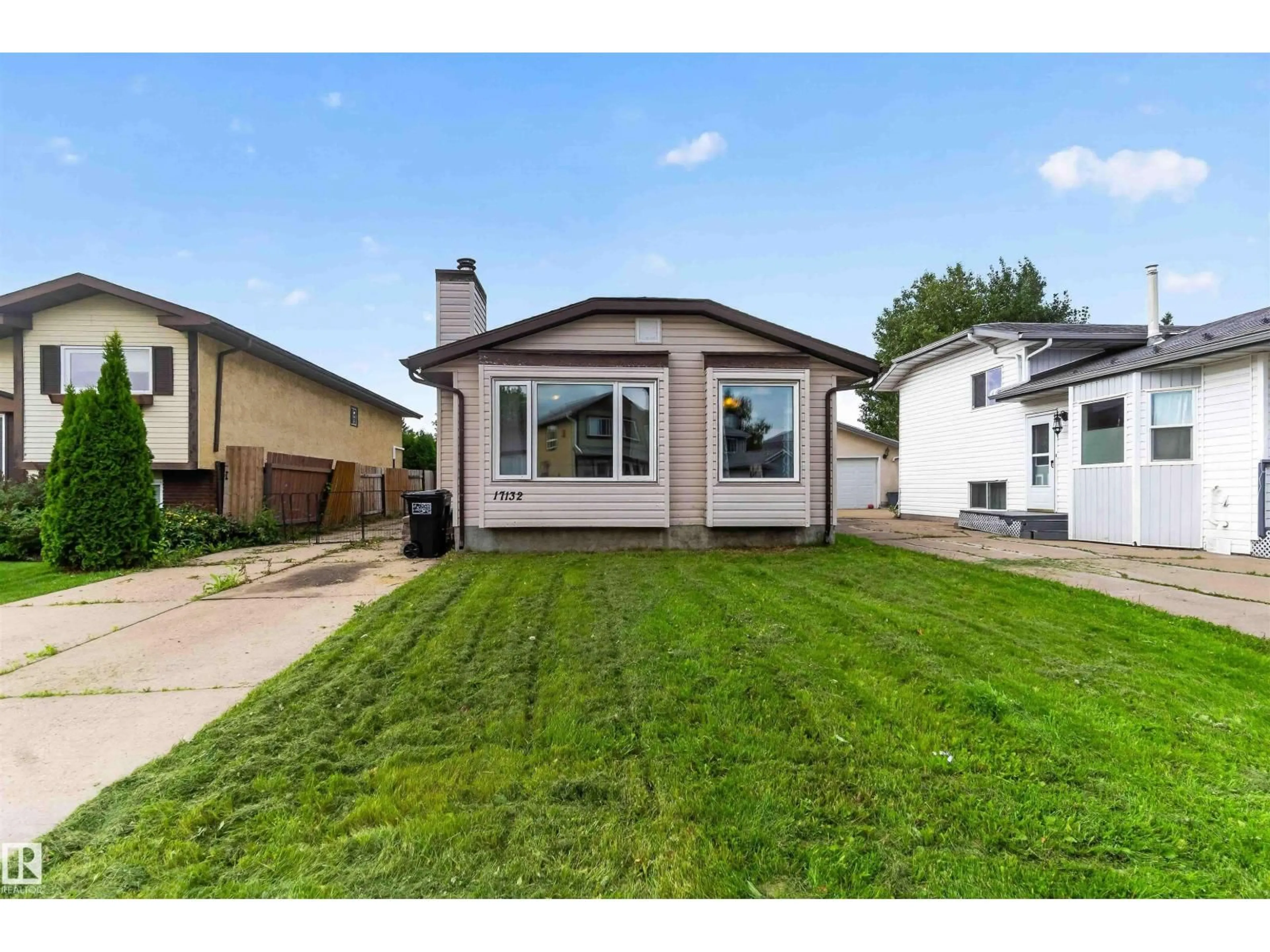 Home with vinyl exterior material, street for 17132 96 ST, Edmonton Alberta T5Z1Z6
