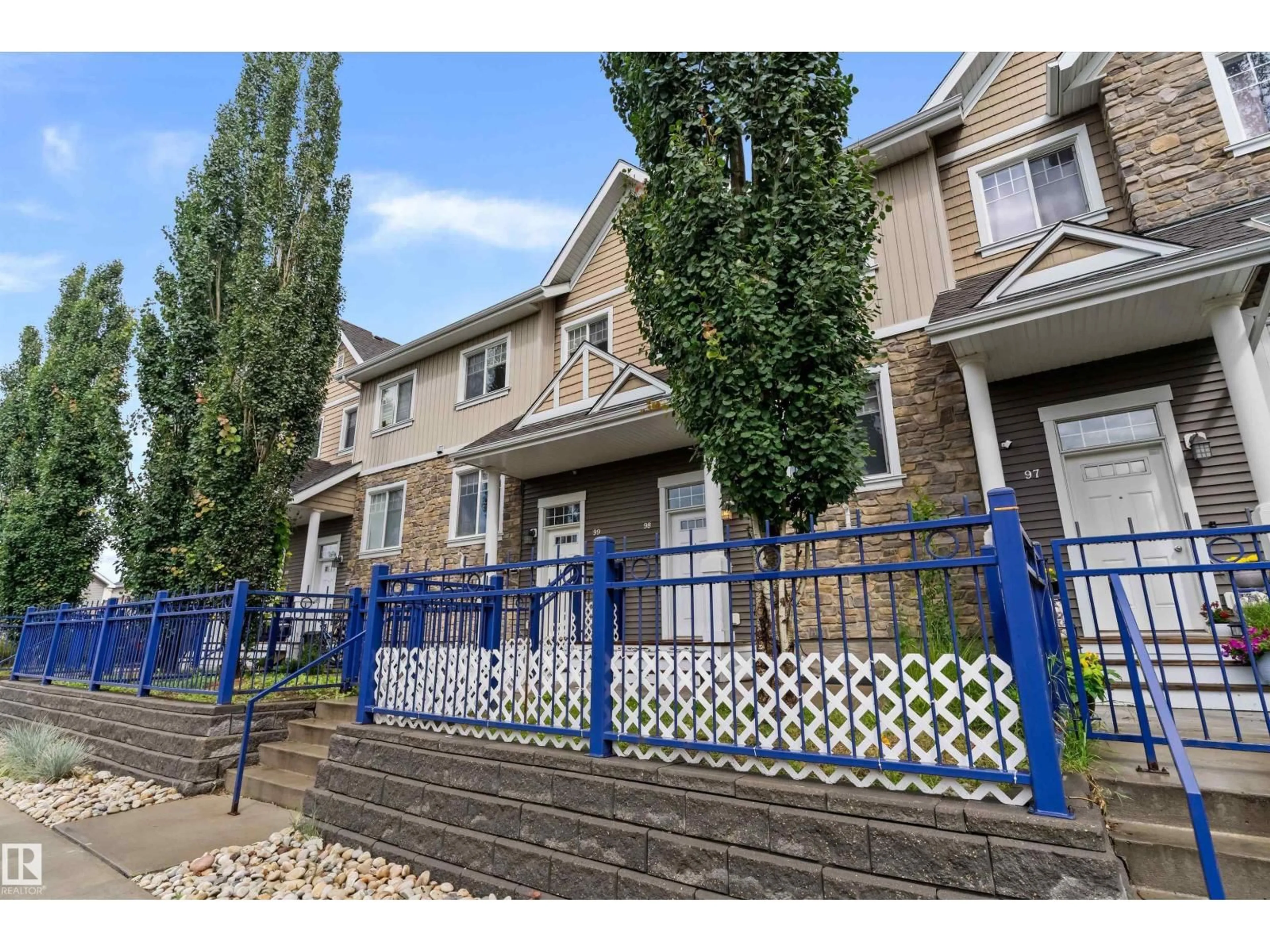 A pic from outside/outdoor area/front of a property/back of a property/a pic from drone, street for #98 - 4050 SAVARYN DR, Edmonton Alberta T6X1R8