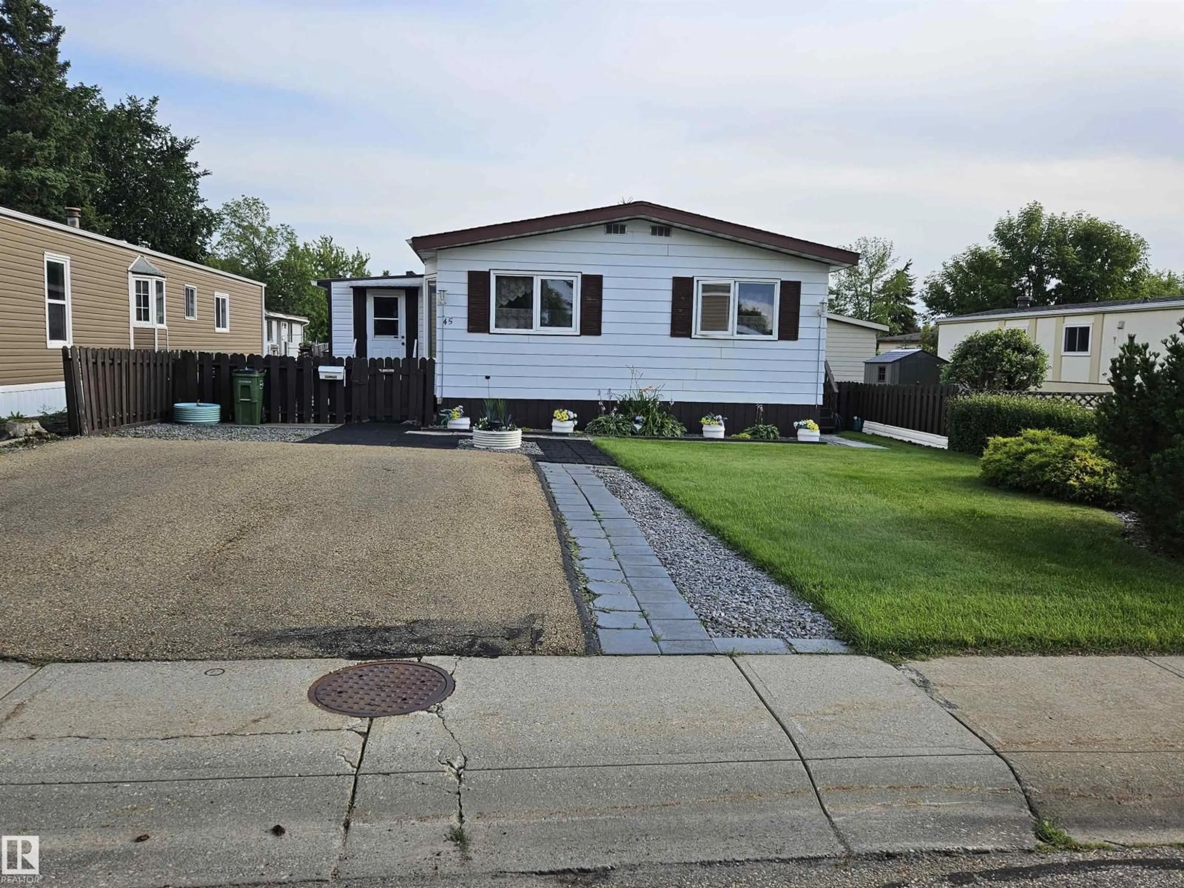 Home with vinyl exterior material, street for 45 OAK RIDGE DR, Edmonton Alberta T6P1G9