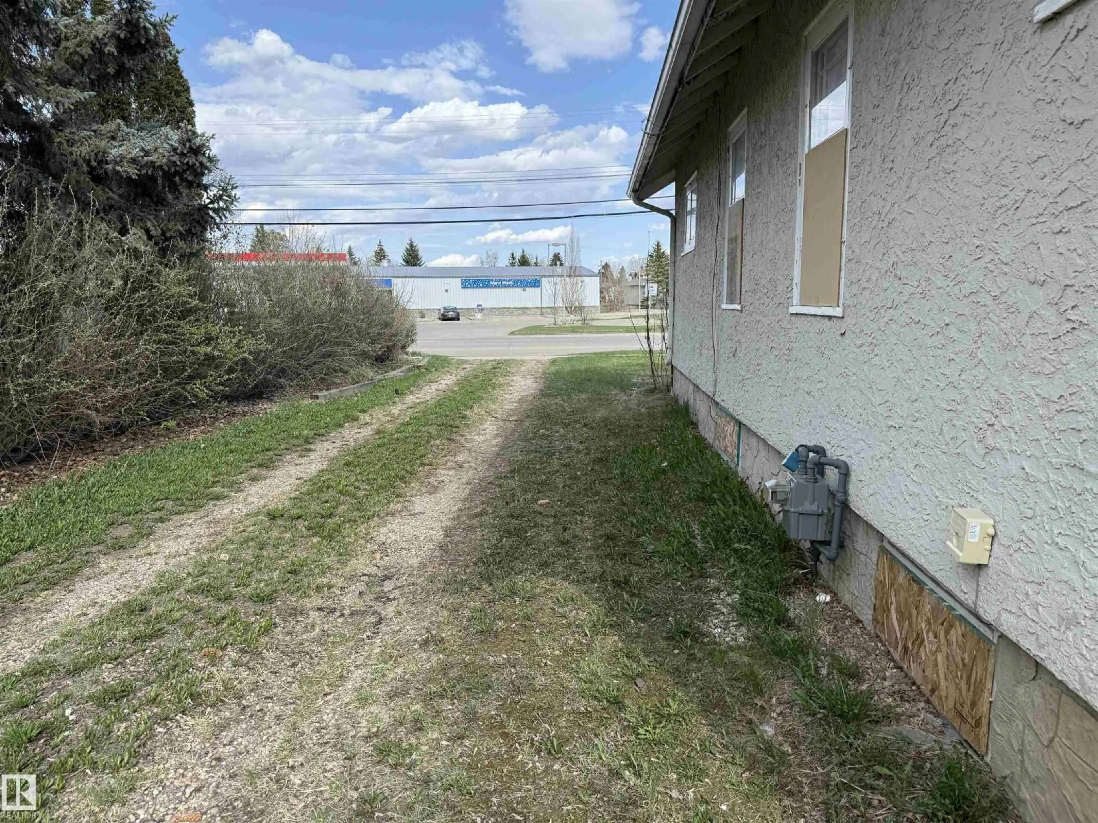 A pic from outside/outdoor area/front of a property/back of a property/a pic from drone, street for 4818 52 ST, Thorsby Alberta T0C2P0