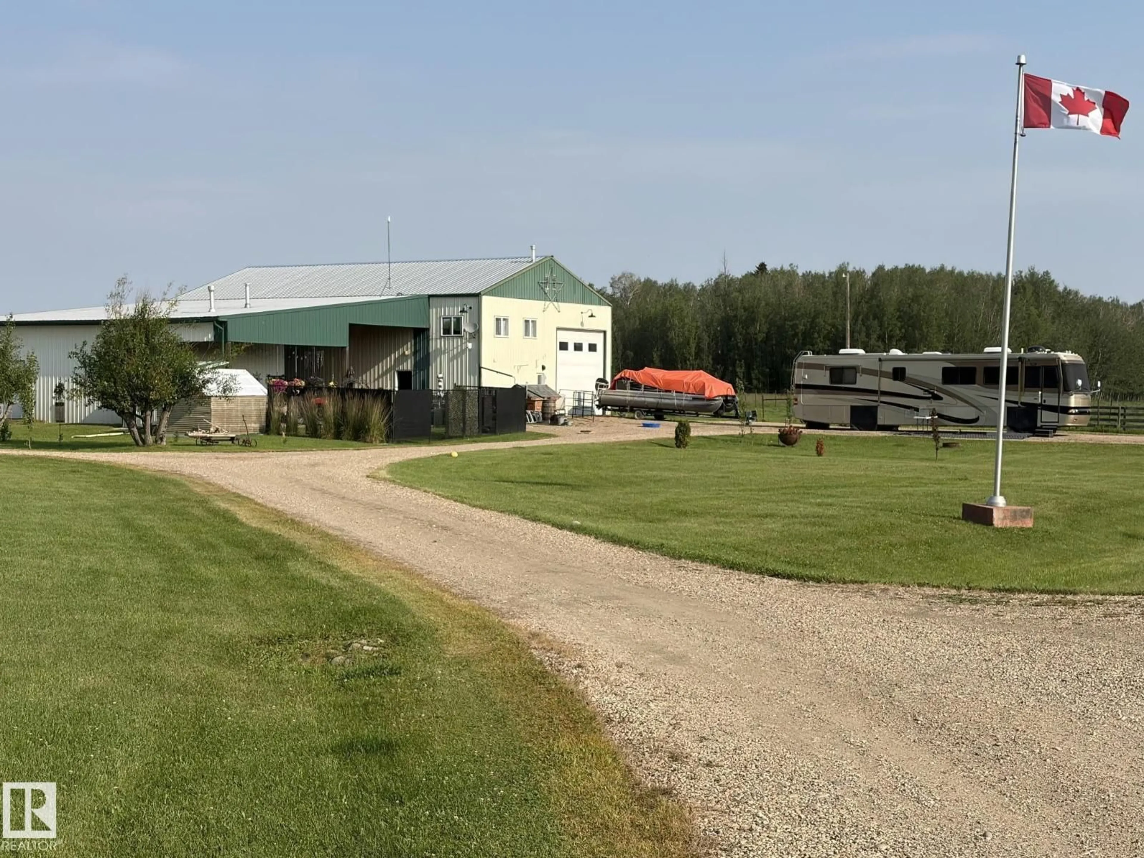 A pic from outside/outdoor area/front of a property/back of a property/a pic from drone, building for A - 62002 TWP ROAD 462, Rural Wetaskiwin County Alberta T0C0T0