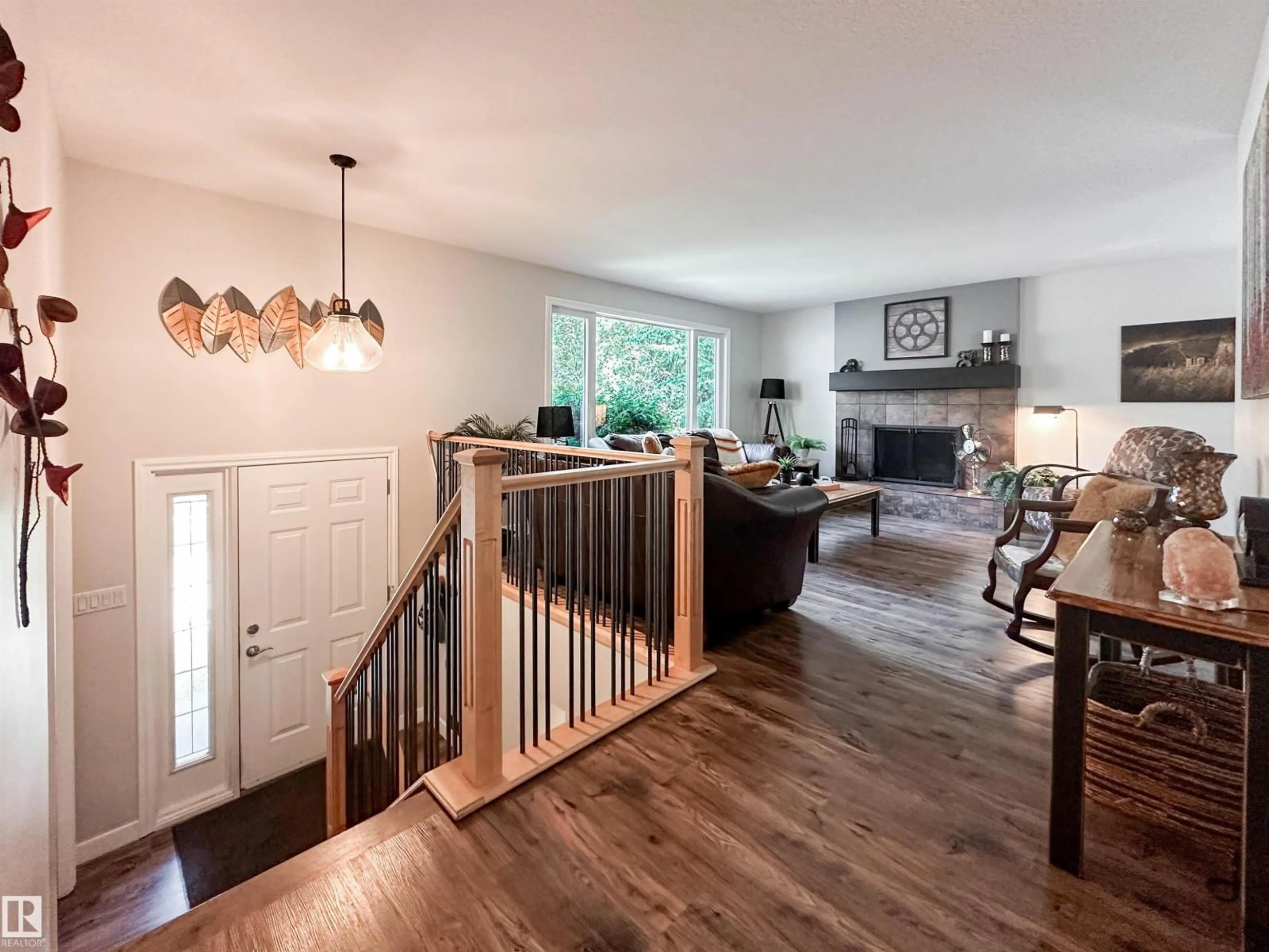 Living room with furniture, wood/laminate floor for 37 ASH CR, St. Albert Alberta T8N3J6