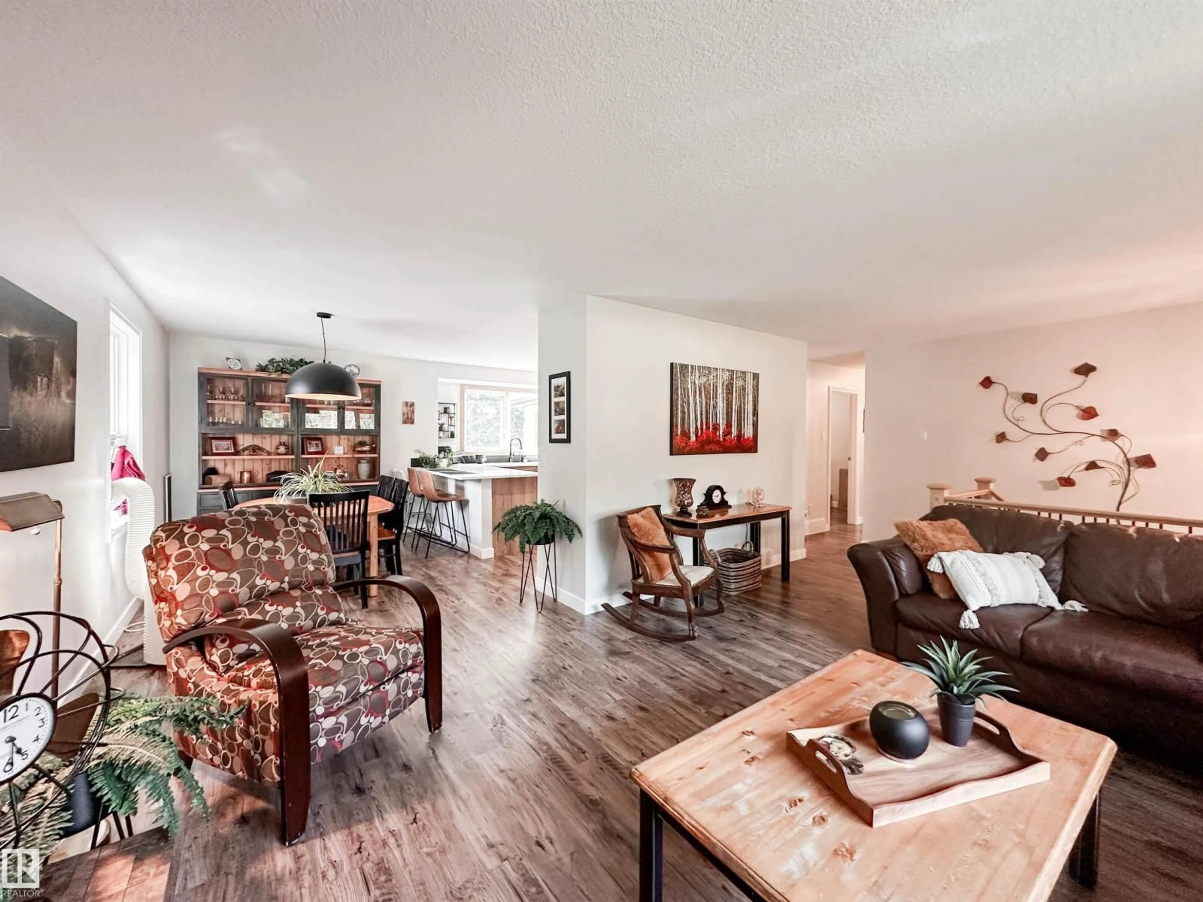 Living room with furniture, wood/laminate floor for 37 ASH CR, St. Albert Alberta T8N3J6