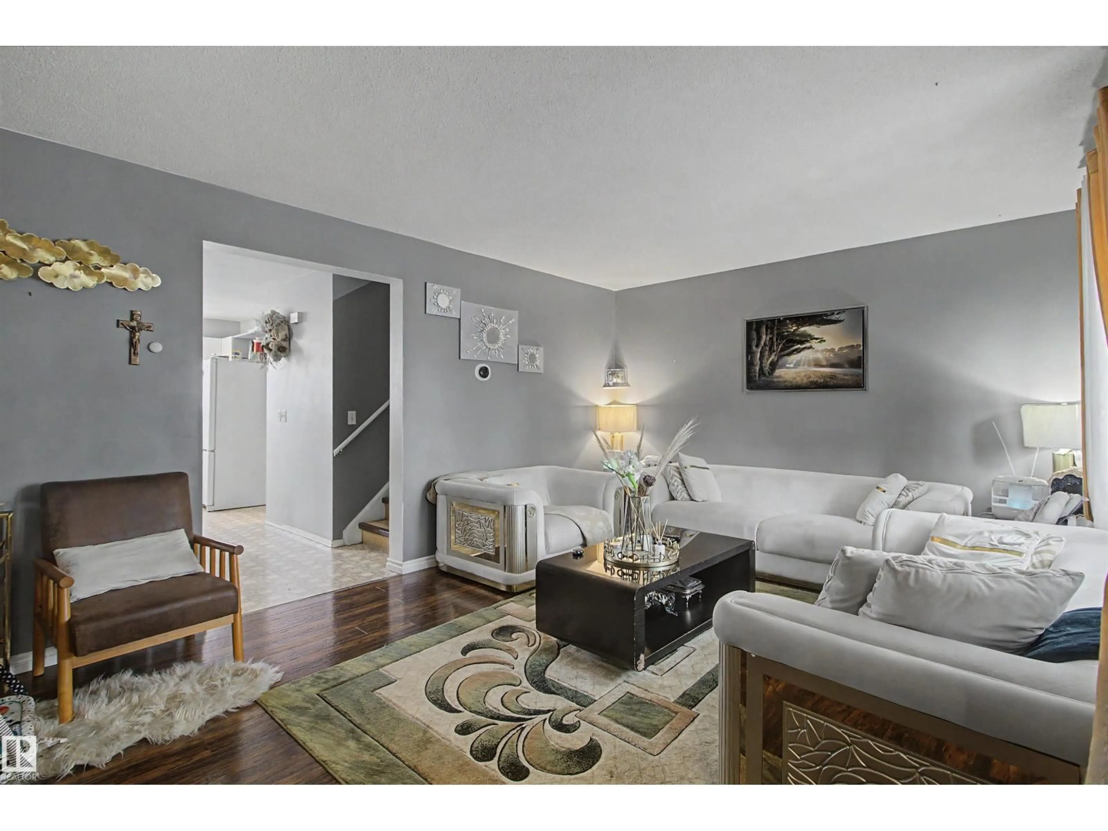 Living room with furniture, unknown for 5724 143 AV, Edmonton Alberta T5A1K1