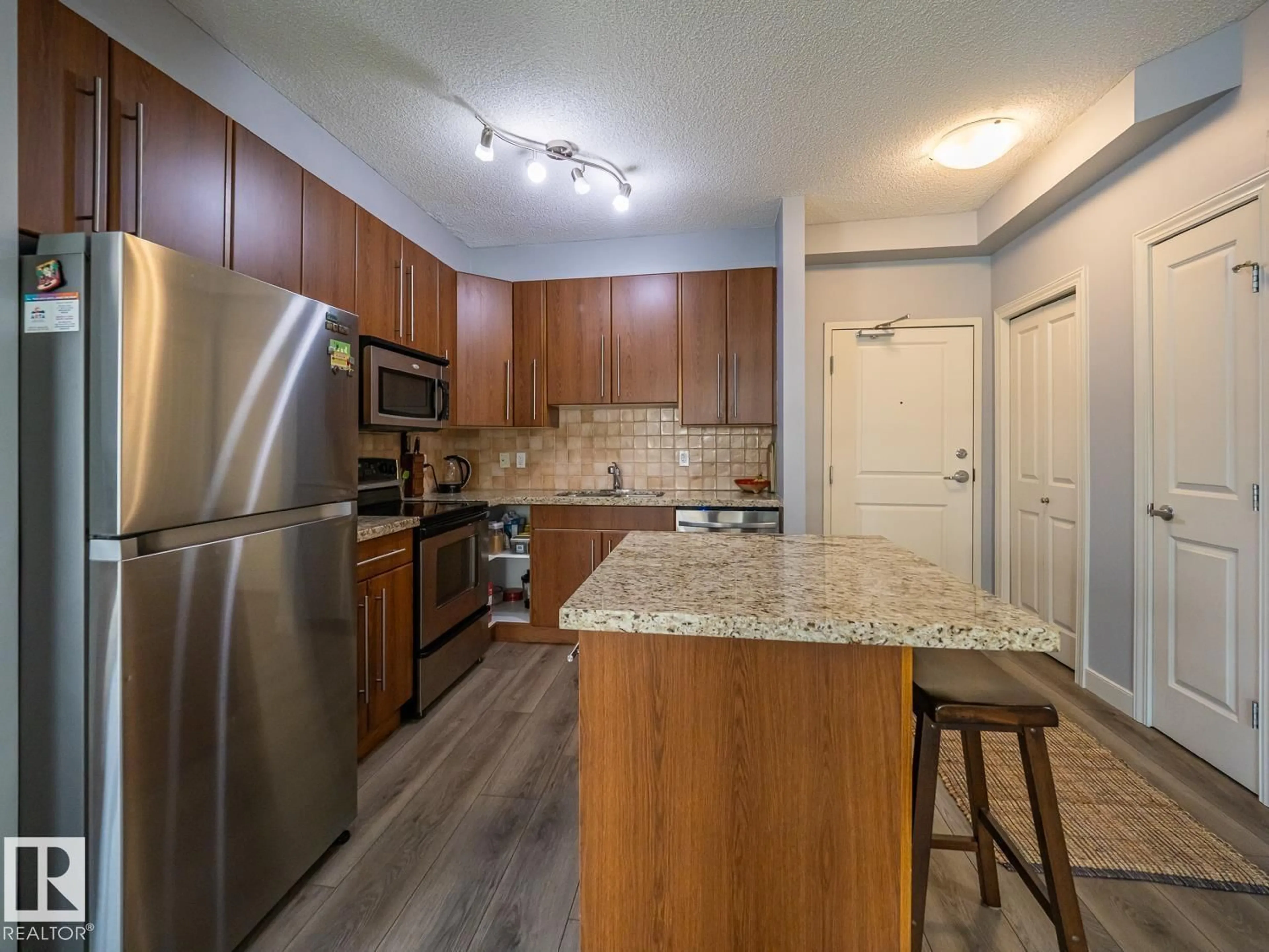 Standard kitchen, wood/laminate floor for 701 - 9819 104 ST, Edmonton Alberta T5K0Y8