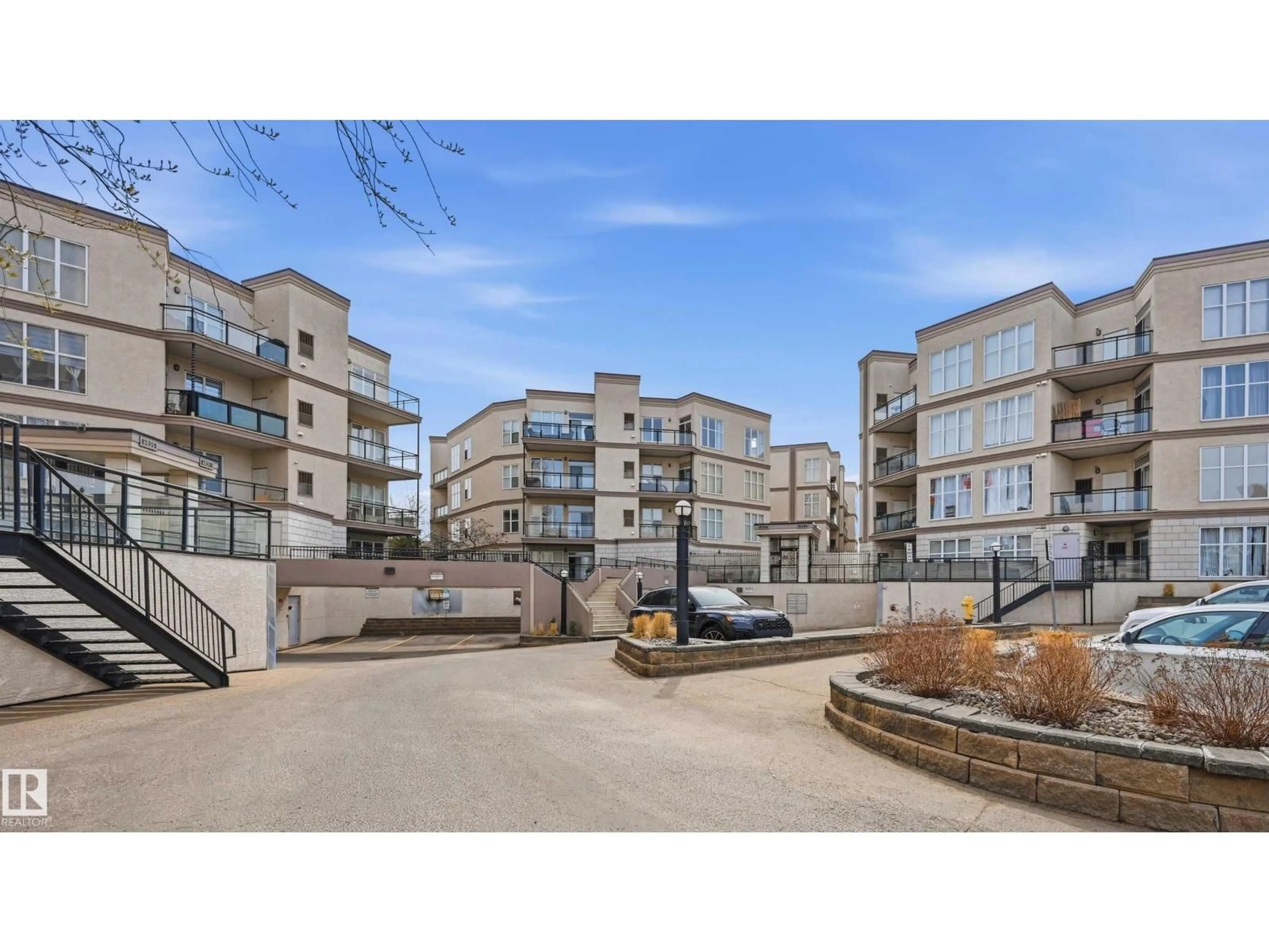 A pic from outside/outdoor area/front of a property/back of a property/a pic from drone, street for 248 - 4827 104A ST NW, Edmonton Alberta T6H0R5