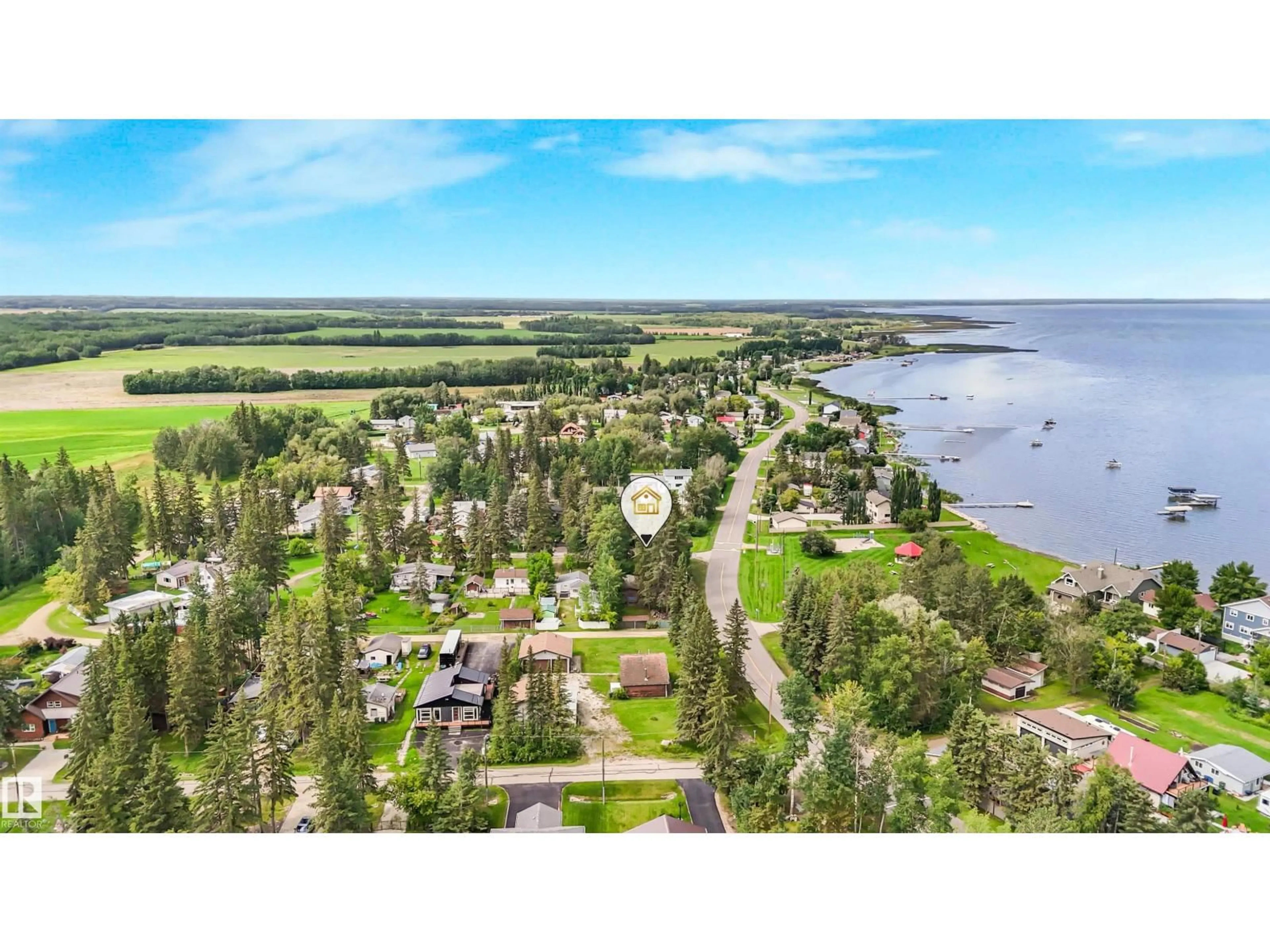 A pic from outside/outdoor area/front of a property/back of a property/a pic from drone, water/lake/river/ocean view for 5001 CRESTVIEW DR, Rural Lac Ste. Anne County Alberta T0A0E0