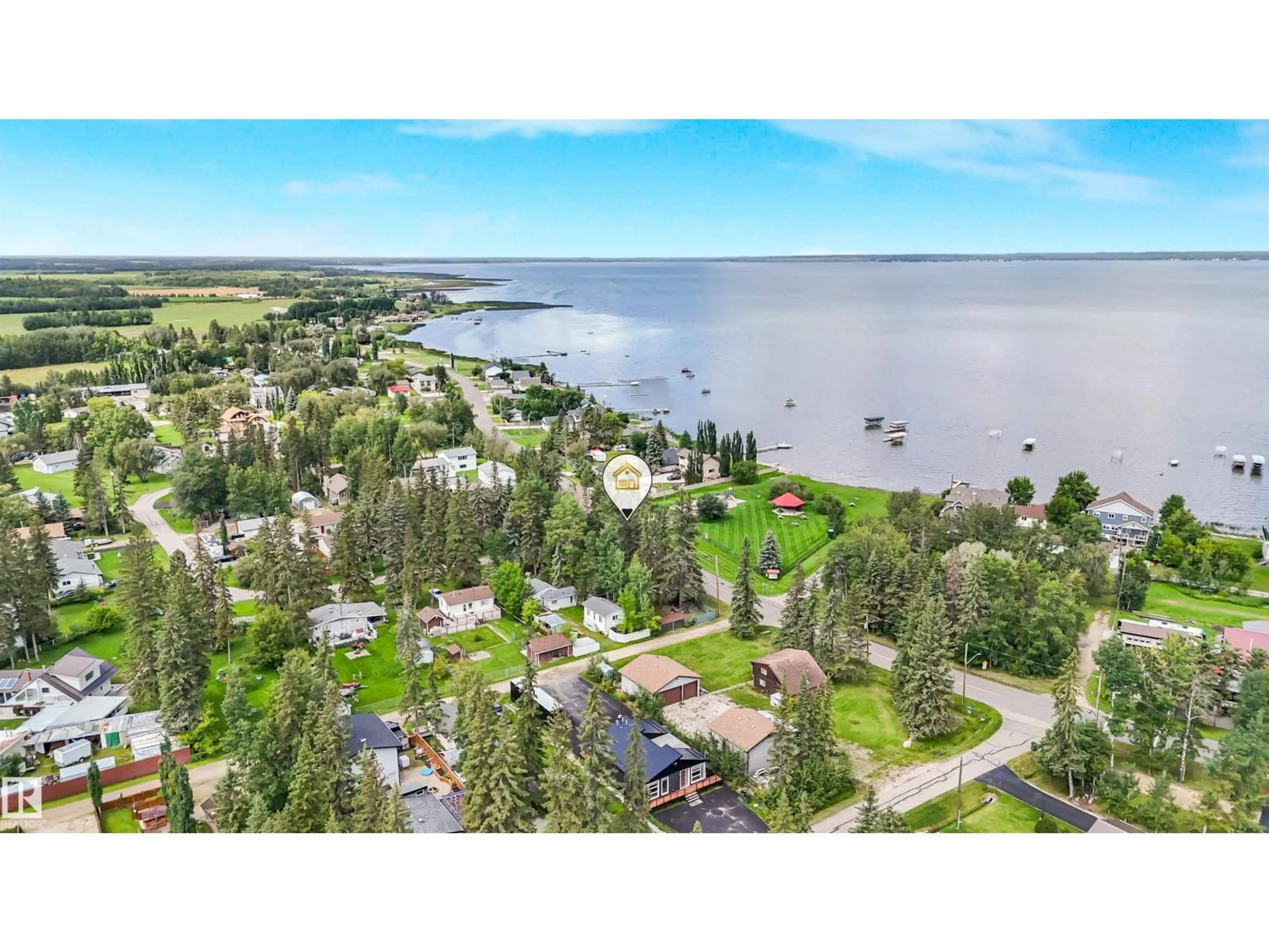 A pic from outside/outdoor area/front of a property/back of a property/a pic from drone, water/lake/river/ocean view for 5001 CRESTVIEW DR, Rural Lac Ste. Anne County Alberta T0A0E0