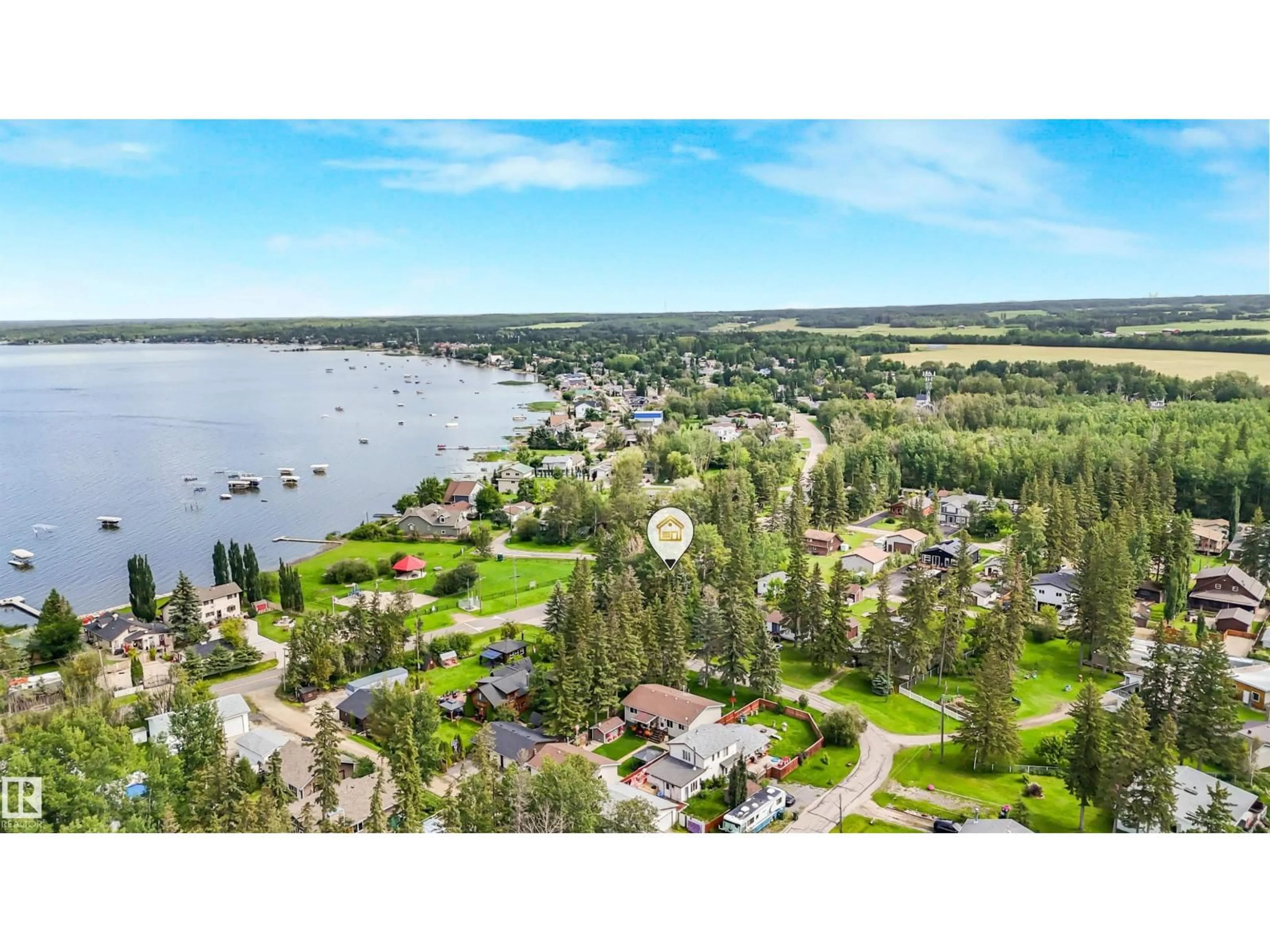A pic from outside/outdoor area/front of a property/back of a property/a pic from drone, water/lake/river/ocean view for 5001 CRESTVIEW DR, Rural Lac Ste. Anne County Alberta T0A0E0