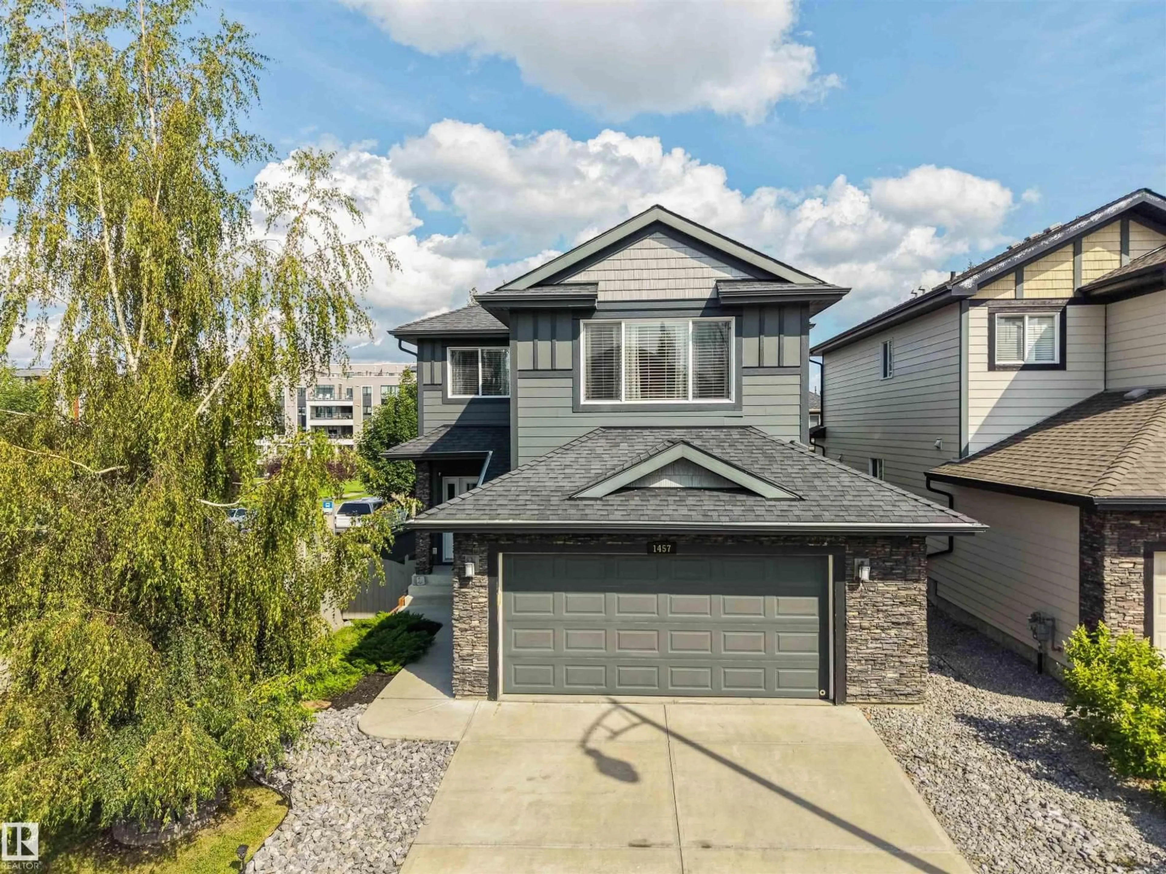 Home with vinyl exterior material, street for SW - 1457 WATES LI, Edmonton Alberta T6W0V1