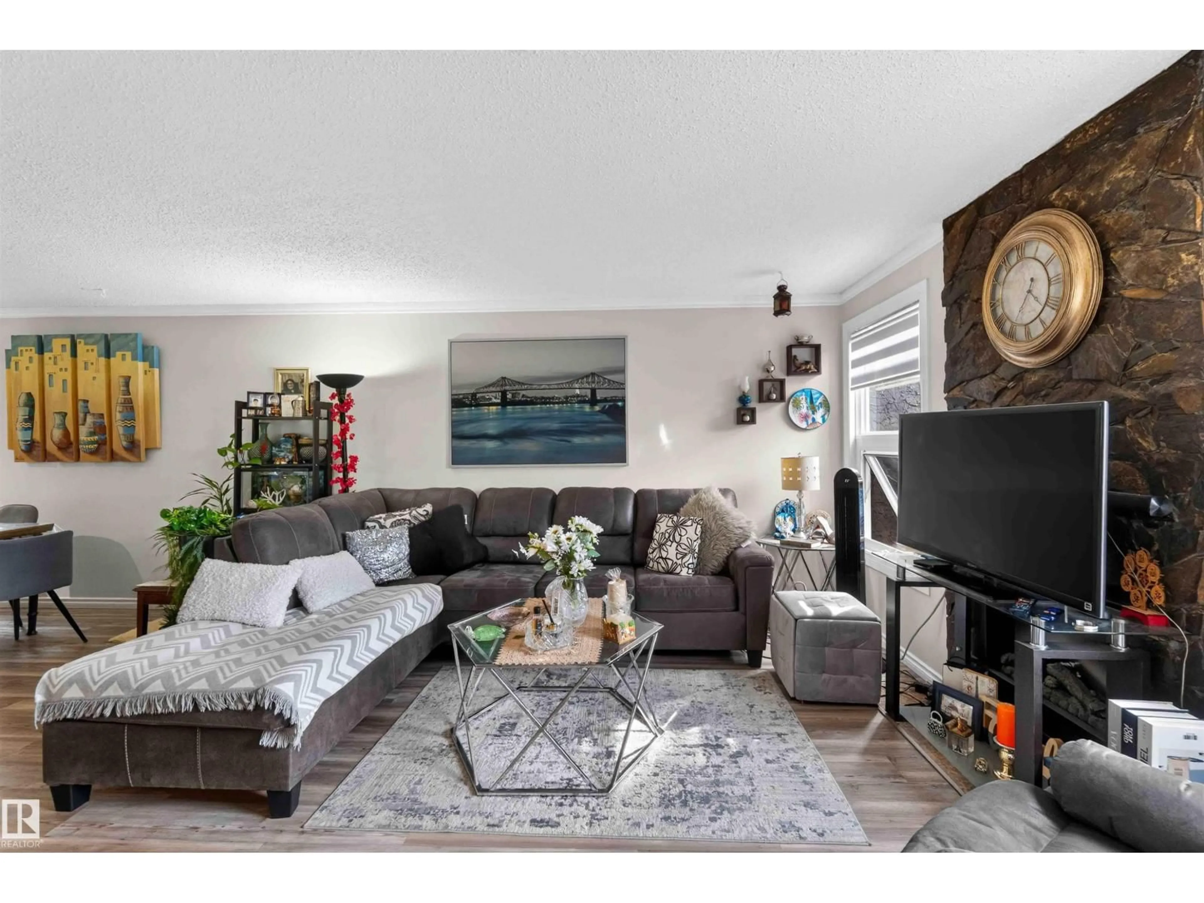 Living room with furniture, wood/laminate floor for 17127 109 ST, Edmonton Alberta T5X3E2