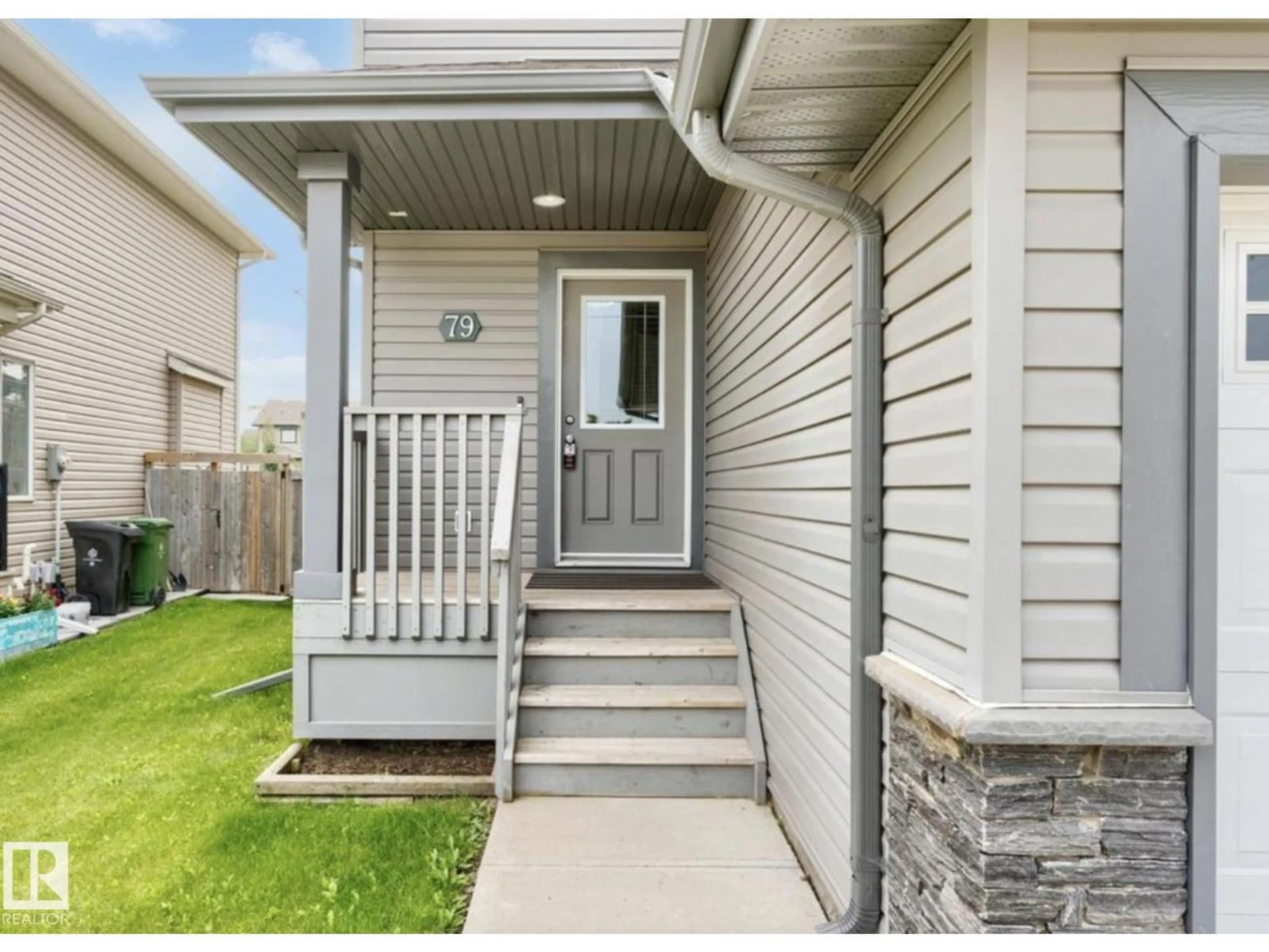 Home with vinyl exterior material, street for 79 CATALINA CT, Fort Saskatchewan Alberta T8L0K5