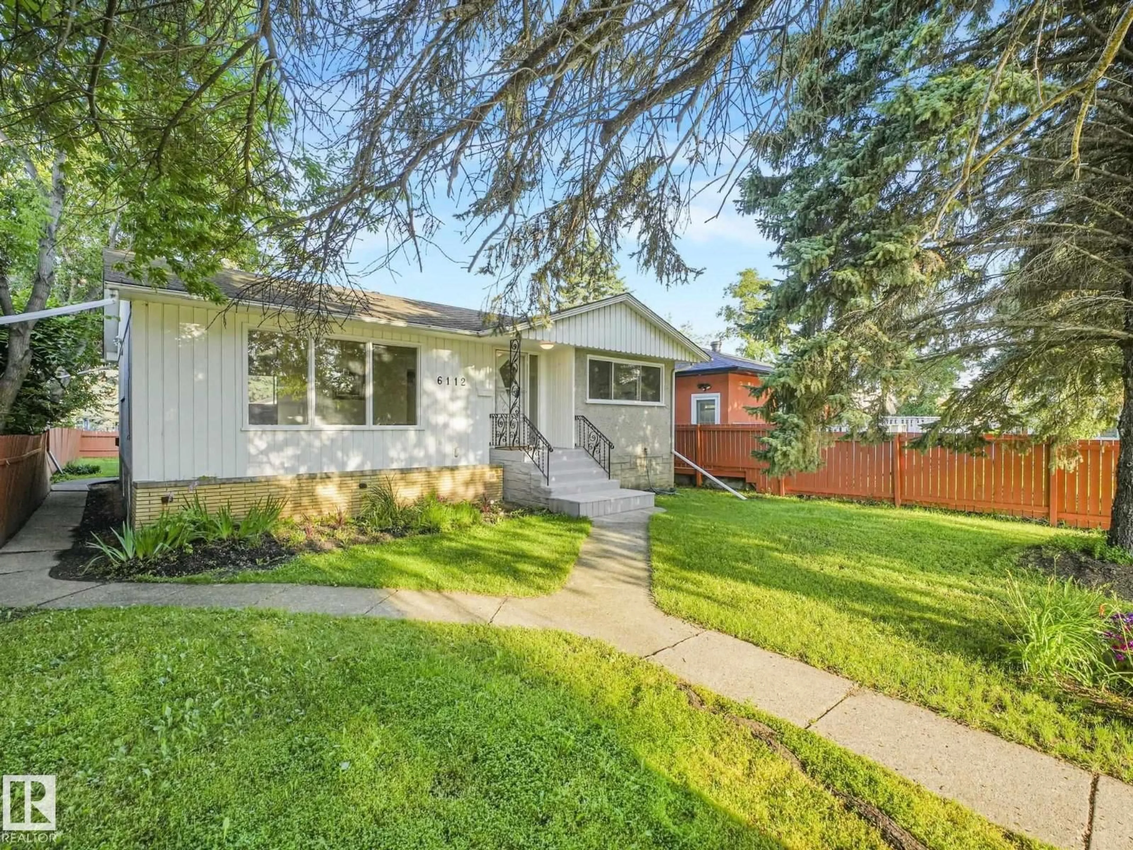 Home with vinyl exterior material, street for NW - 6112 105A ST, Edmonton Alberta T6H2P8