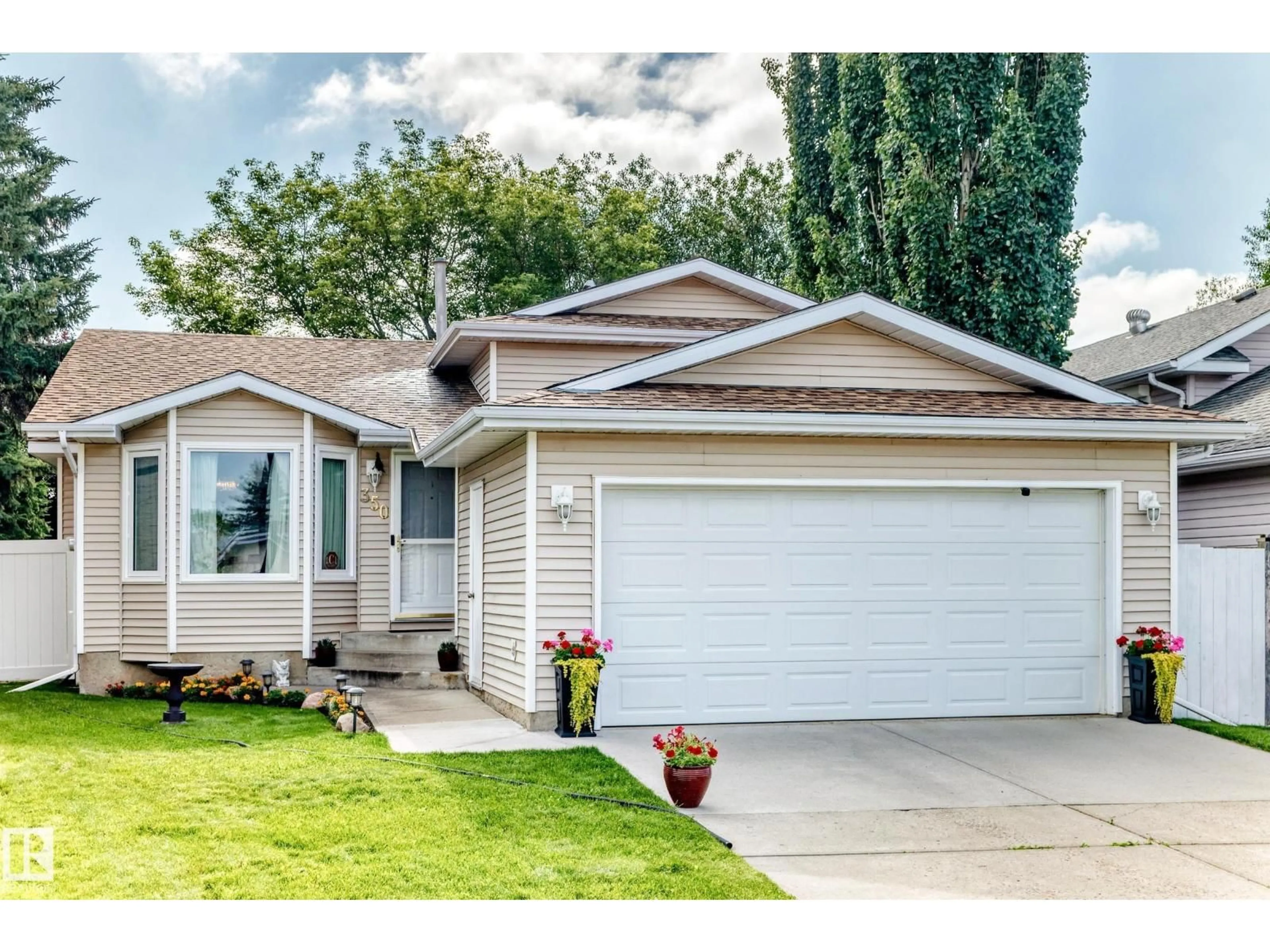 Home with vinyl exterior material, street for 350 PEARSON CR, Edmonton Alberta T5T5Y7