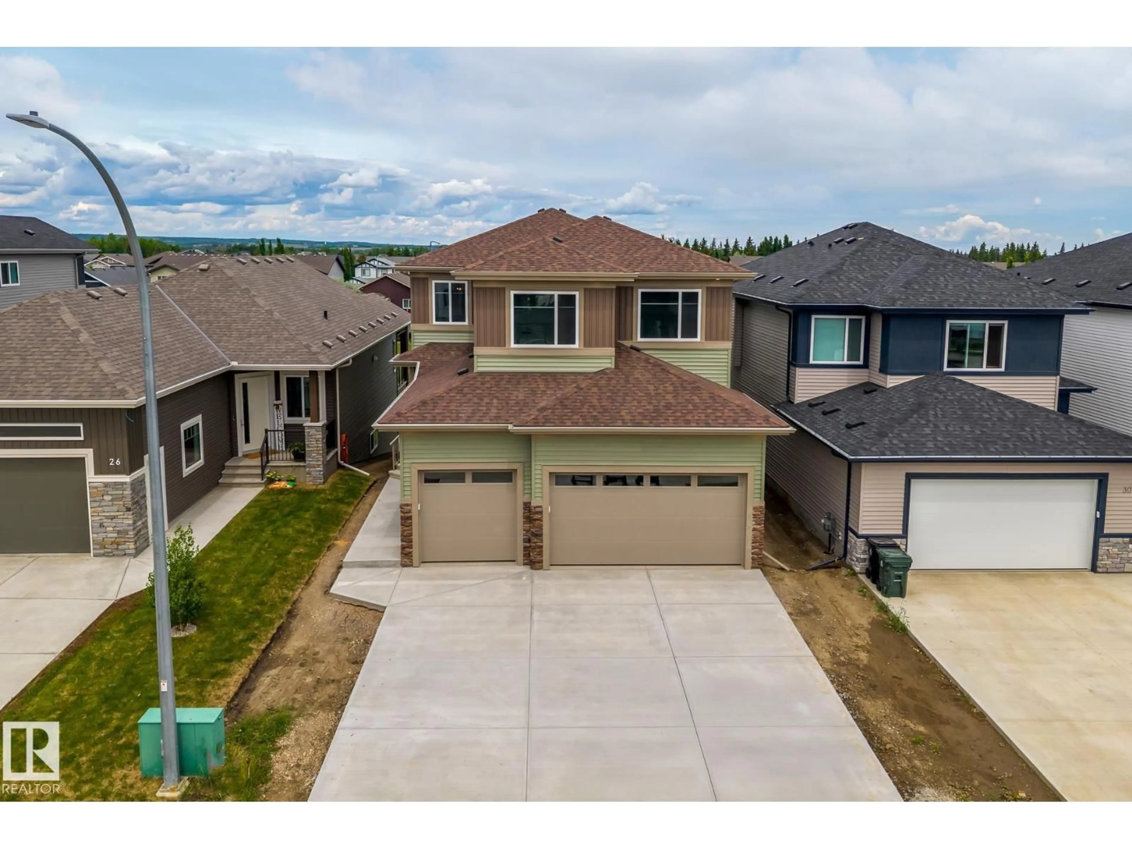 A pic from outside/outdoor area/front of a property/back of a property/a pic from drone, street for 28 HARLEY WY, Spruce Grove Alberta T7X0X4