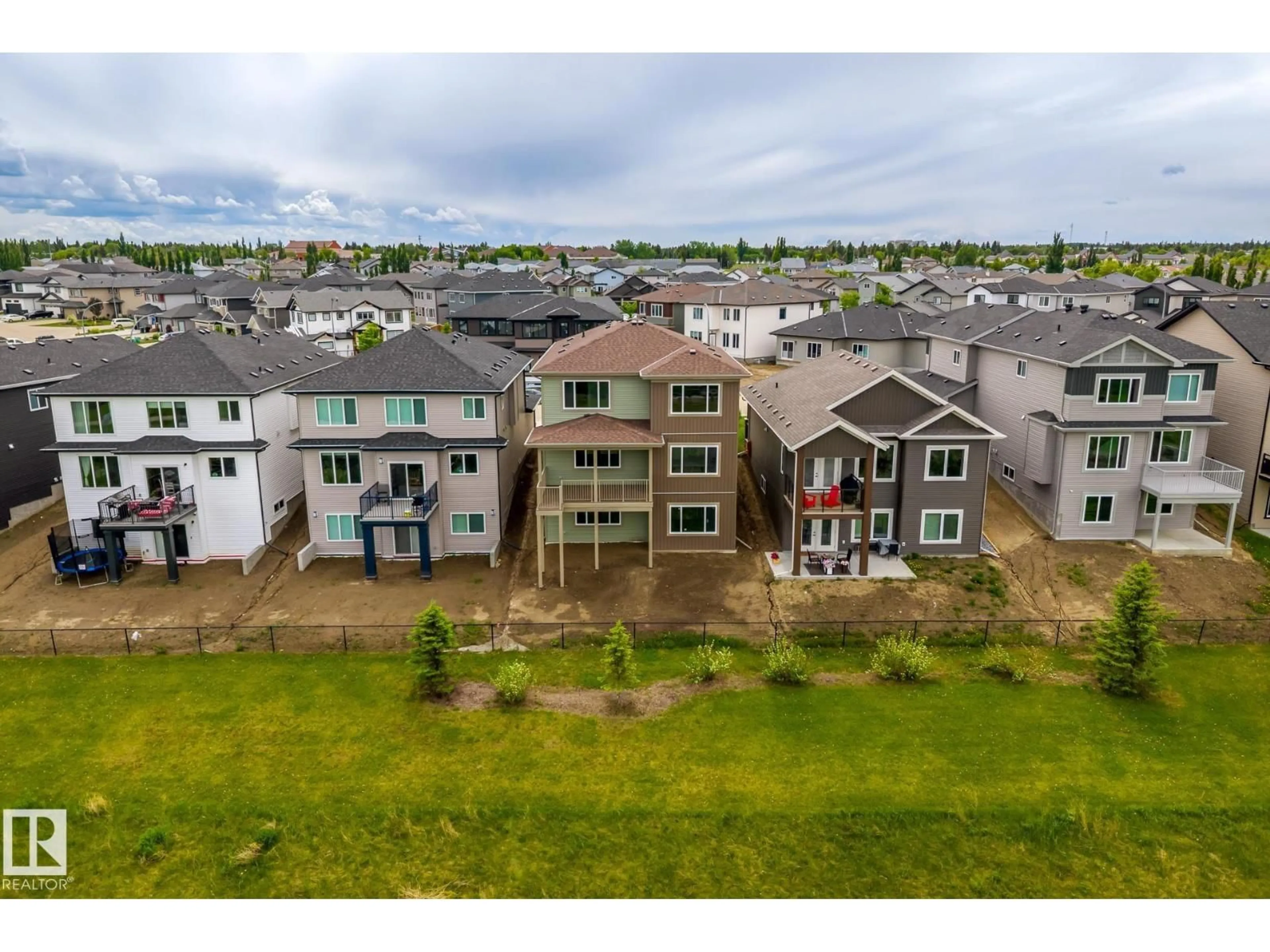 A pic from outside/outdoor area/front of a property/back of a property/a pic from drone, unknown for 28 HARLEY WY, Spruce Grove Alberta T7X0X4