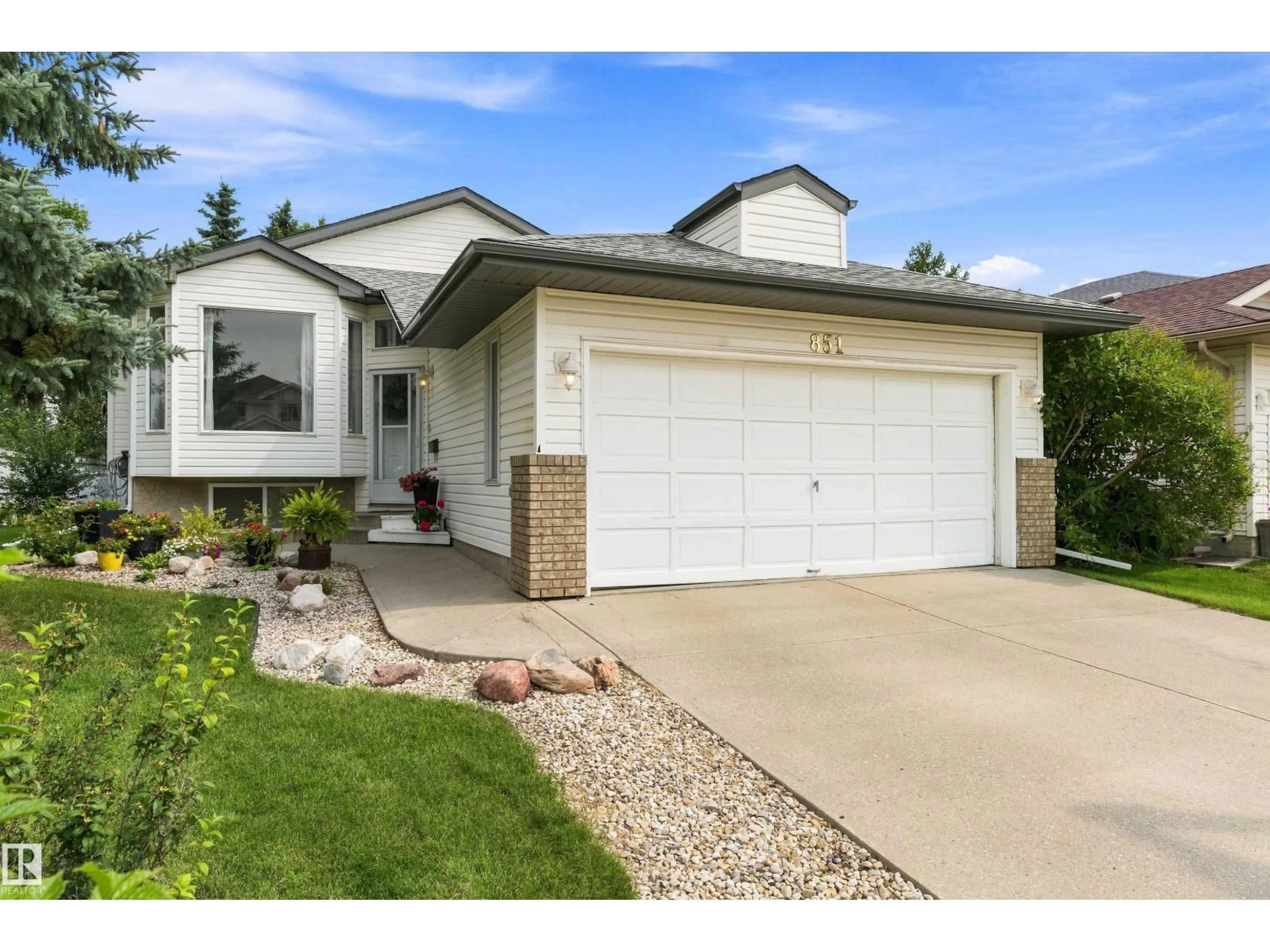 Home with vinyl exterior material, street for NW - 851 112A ST, Edmonton Alberta T6J6W2