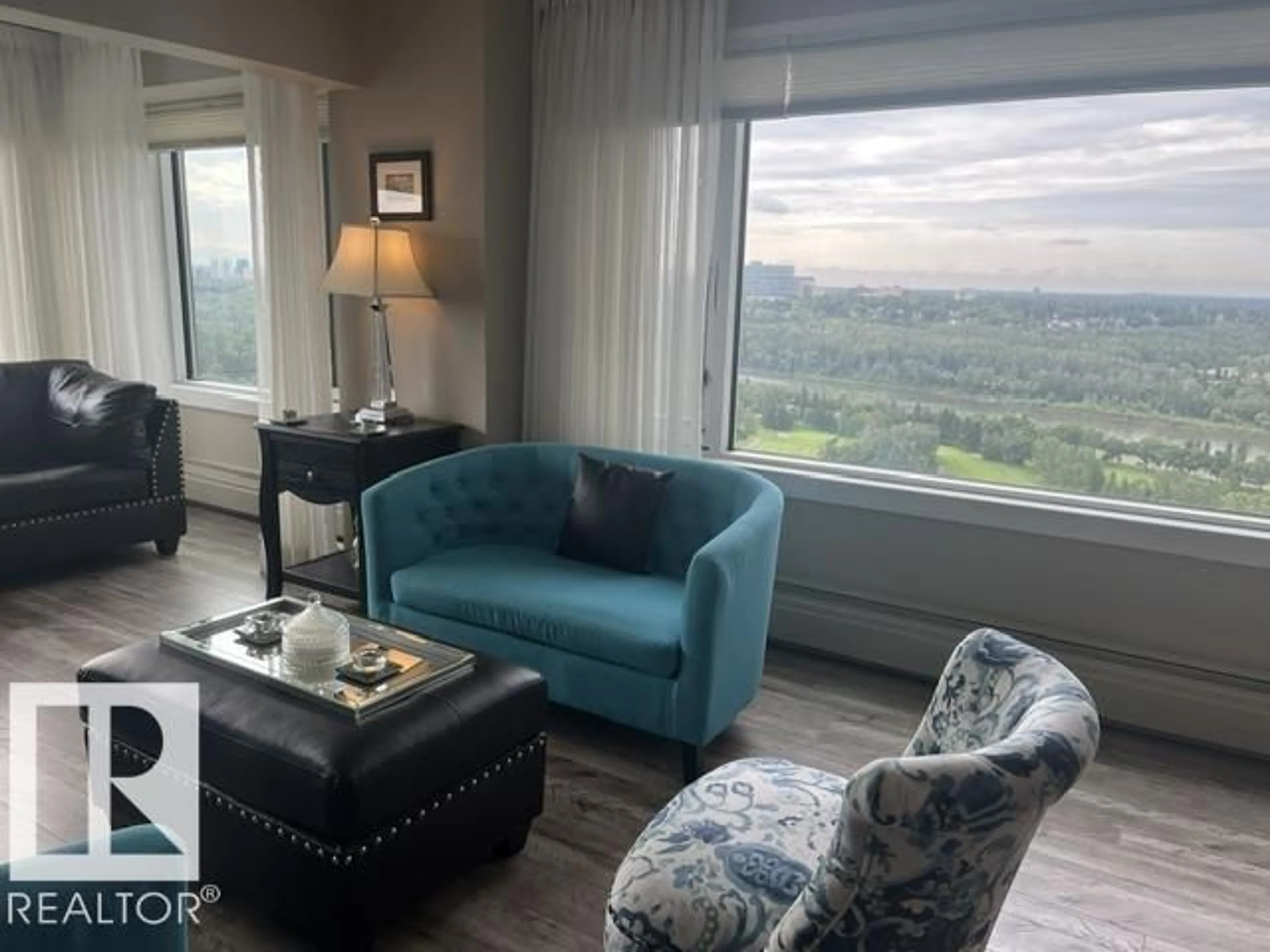 Living room with furniture, wood/laminate floor for 10011 - 1501 123 ST, Edmonton Alberta T5N1M9