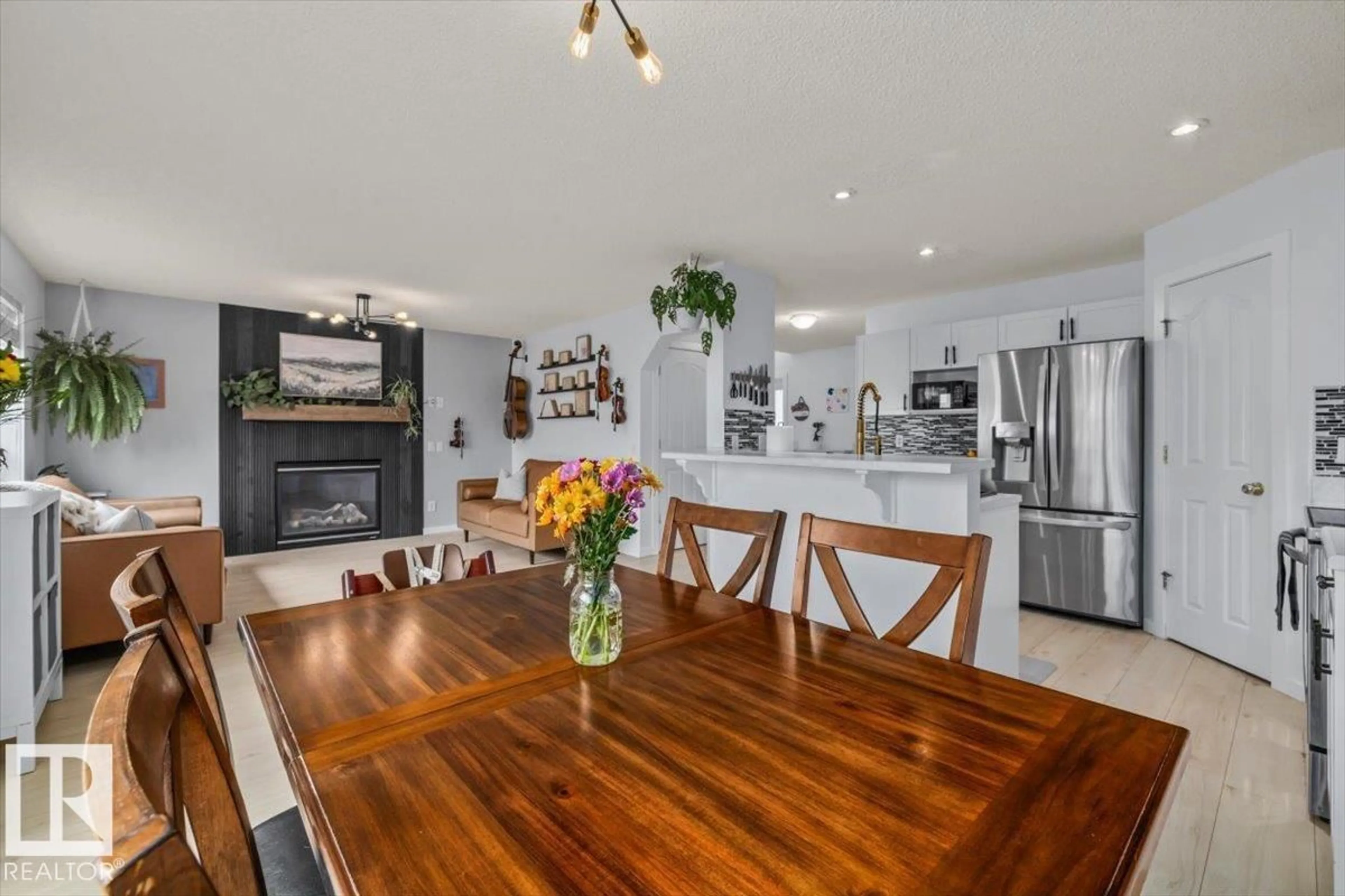 Open concept kitchen, wood/laminate floor for 19040 47 AV, Edmonton Alberta T6M2V6